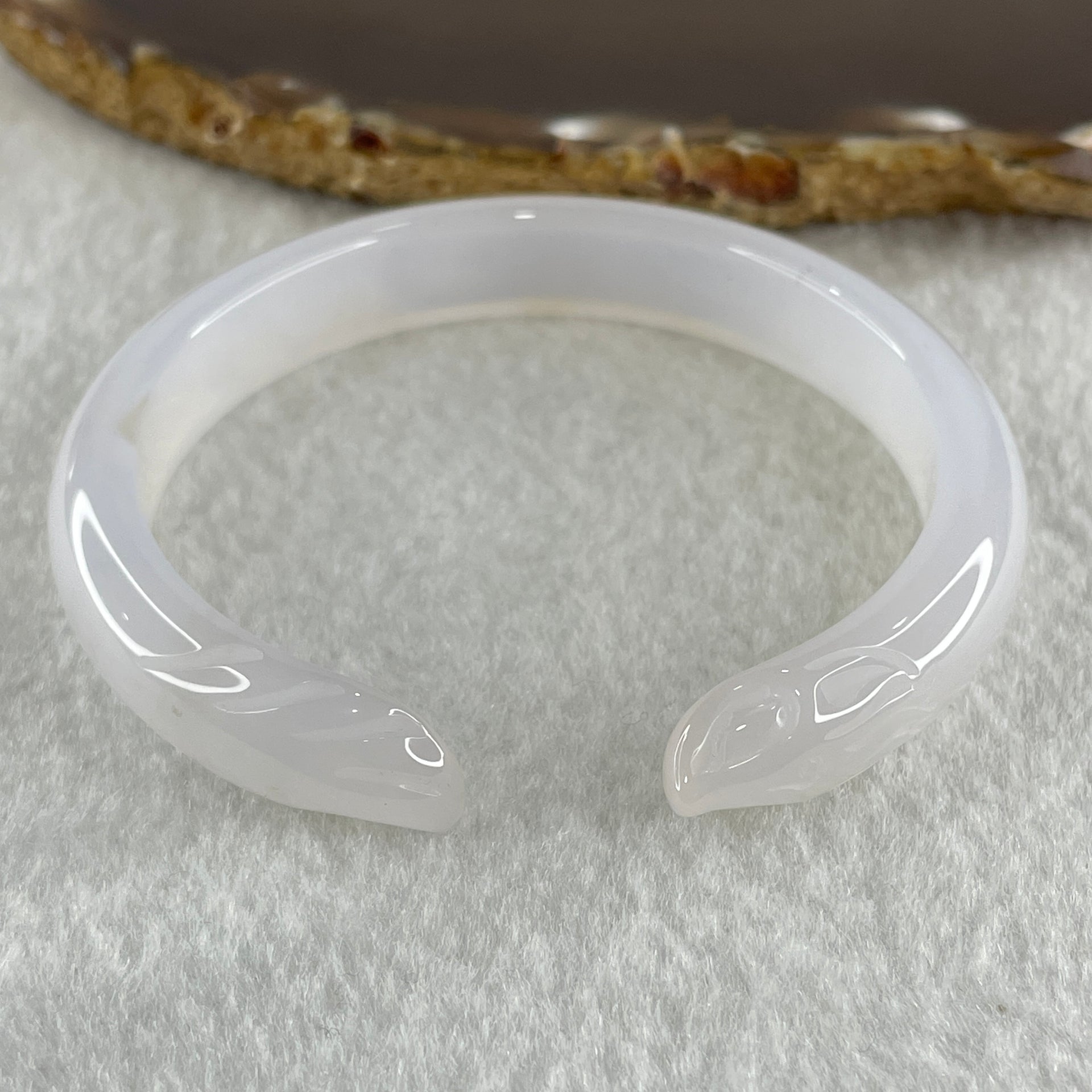 Natural Pinky Agate 9 Tail Fox Bangle 29.8g Internal Diameter 58.7mm 10.8 by 7.2mm - Huangs Jadeite and Jewelry Pte Ltd