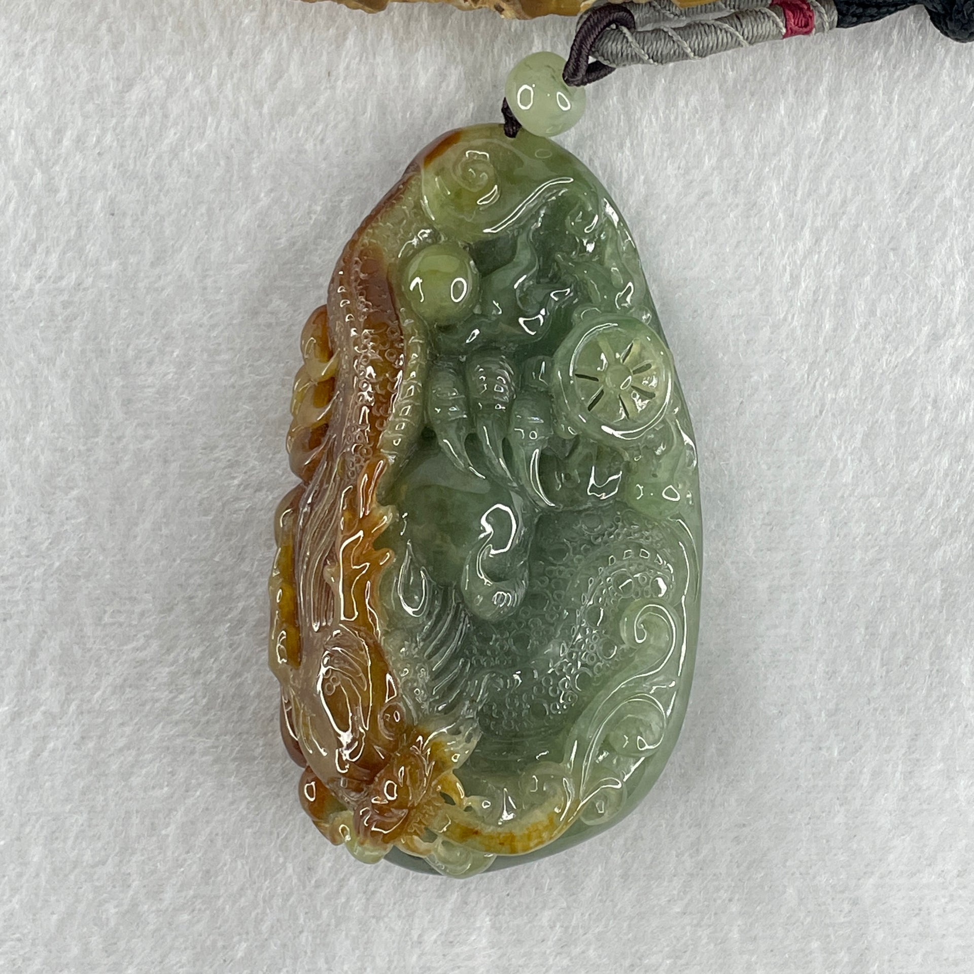 Grand Master Type A Light Green with Yellow Patches Jadeite Dragon Double Side Pendant 100.73g 35.0 by 43.3 by 20.9mm - Huangs Jadeite and Jewelry Pte Ltd