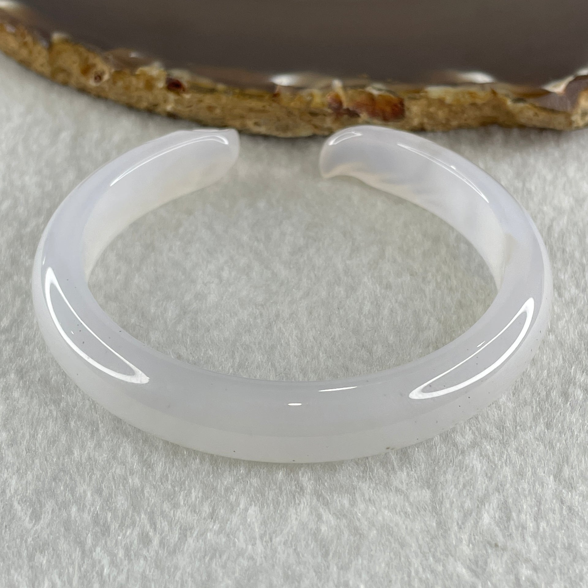 Natural Pinky Agate 9 Tail Fox Bangle 29.8g Internal Diameter 58.7mm 10.8 by 7.2mm - Huangs Jadeite and Jewelry Pte Ltd