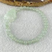 Type A Light Blueish Green Jadeite Beads with Faint Lavender Green Male Pixiu Charm Bracelet 13.83g 16.5cm 5.4mm 32 Beads 20.0 by 15.6 by 10.0mm - Huangs Jadeite and Jewelry Pte Ltd