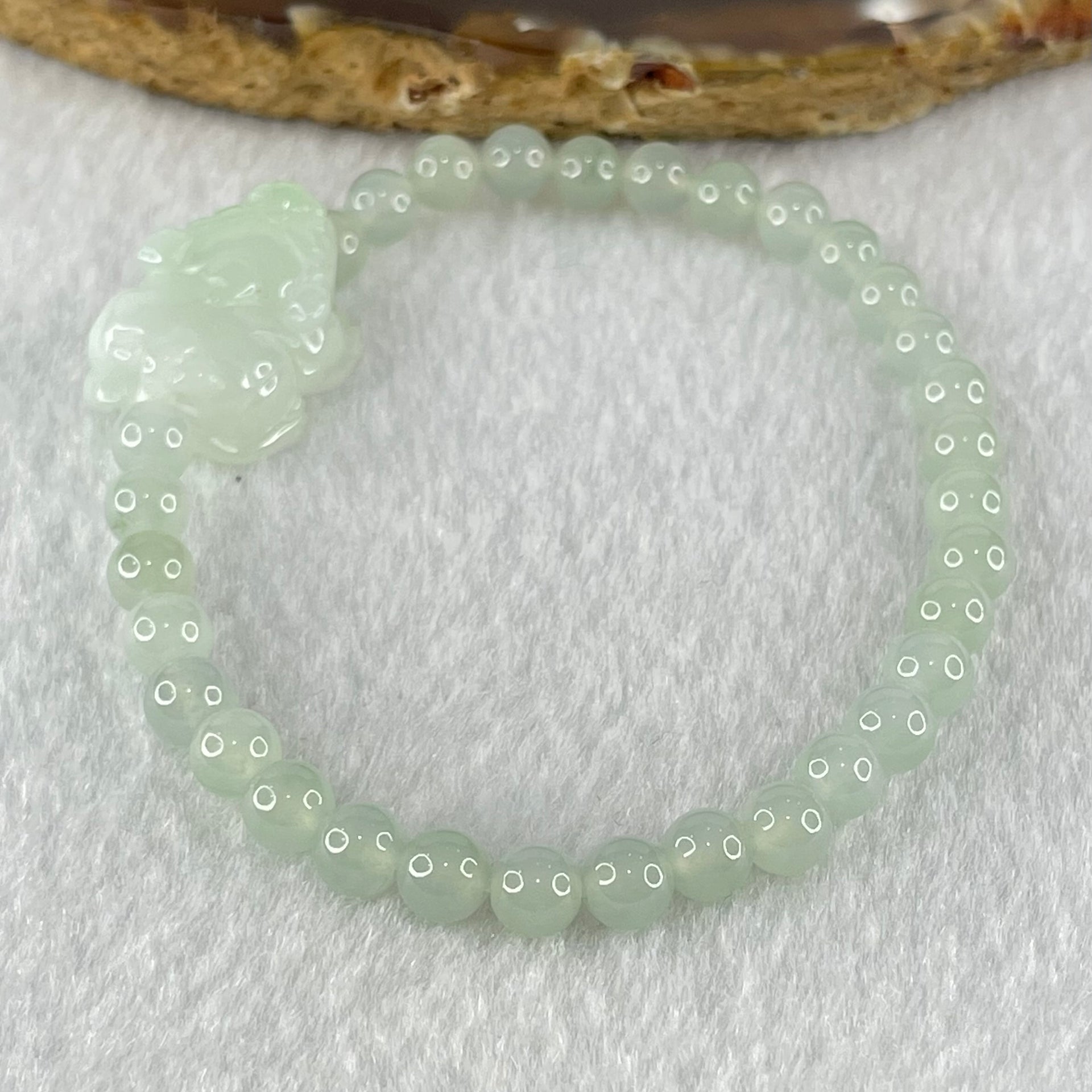 Type A Light Blueish Green Jadeite Beads with Faint Lavender Green Male Pixiu Charm Bracelet 13.83g 16.5cm 5.4mm 32 Beads 20.0 by 15.6 by 10.0mm - Huangs Jadeite and Jewelry Pte Ltd