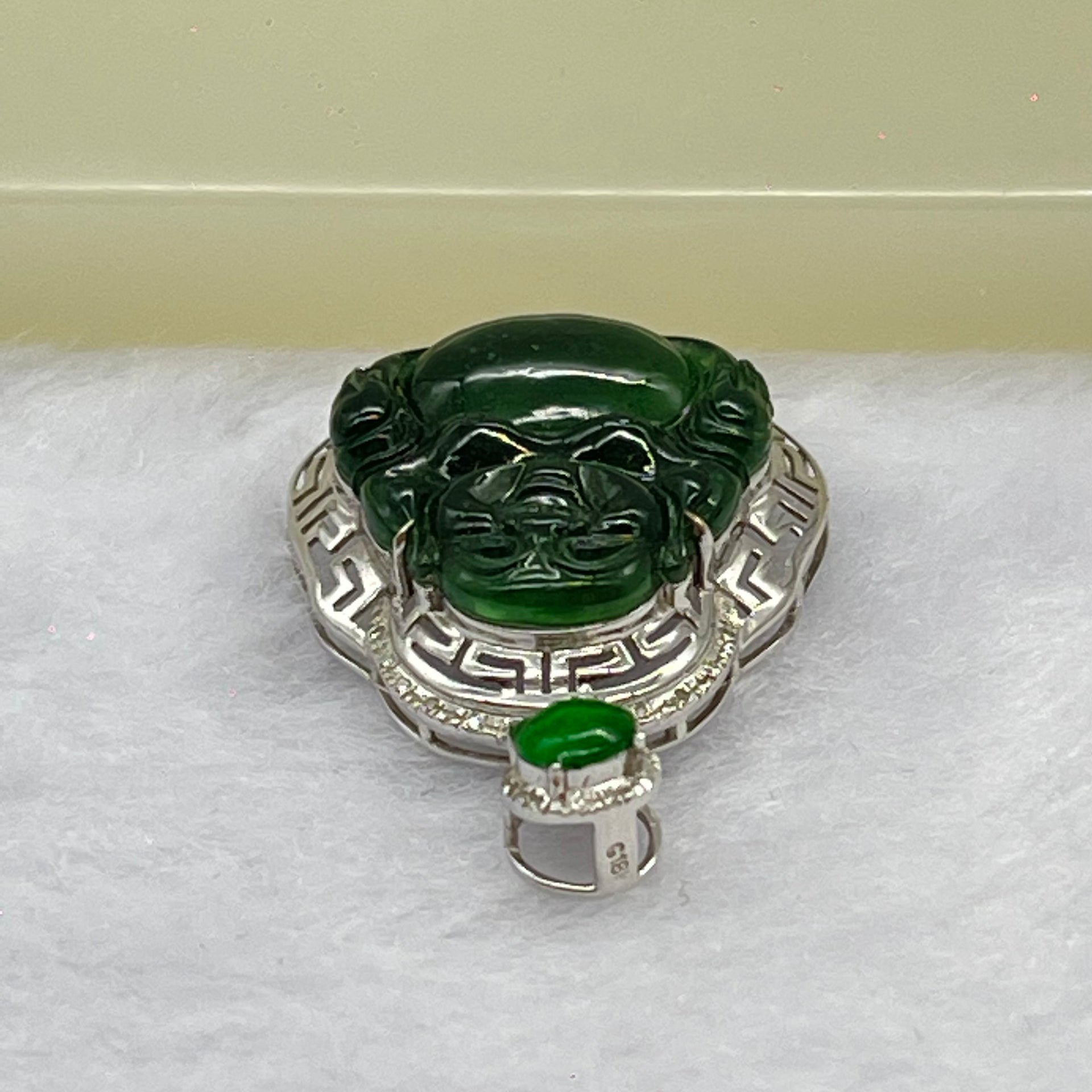 Type A Blueish Green Jadeite Milo Buddha Pendant Setting 18k White Gold 2.45g 25.6 by 19.4 by 7.2mm - Huangs Jadeite and Jewelry Pte Ltd