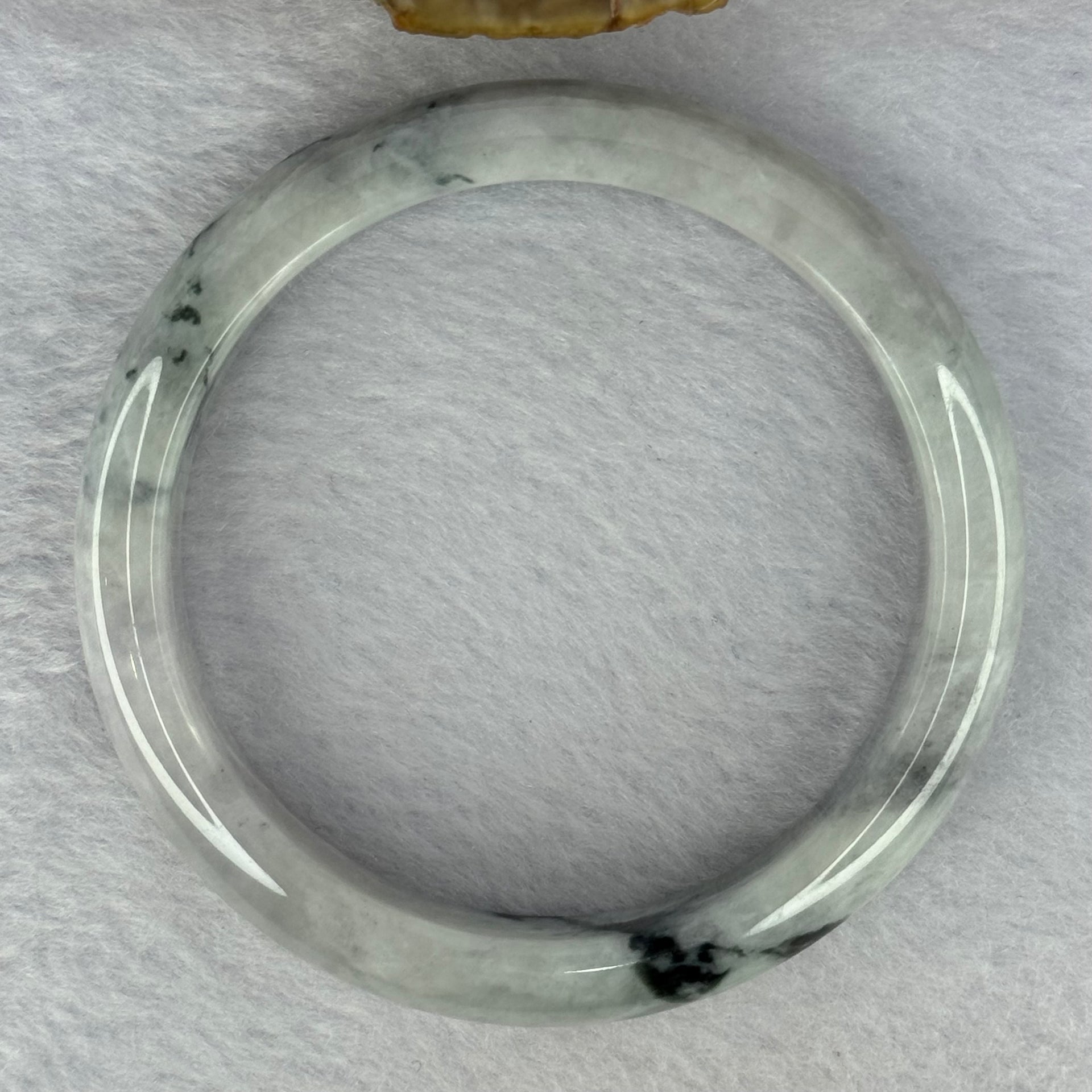 Type A Green Lavender with Dark Green Patches 50.67g Internal Diameter 57.5mm 12.6 by 8.2mm (Internal Lines) - Huangs Jadeite and Jewelry Pte Ltd