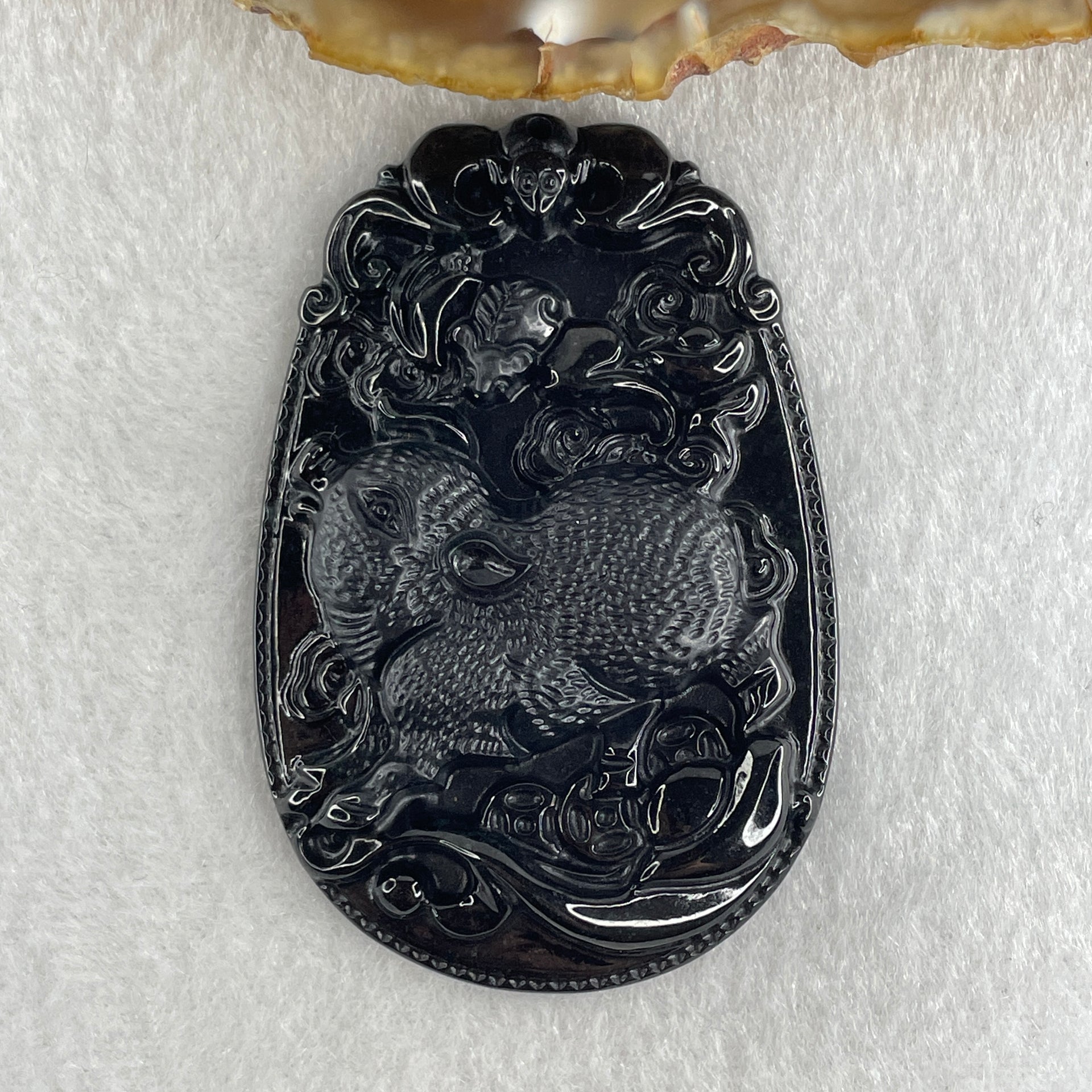 Type A Opaque to Partial Translucent Black Omphacite Jadeite Pig Pendant 26.30g 59.7 by 40.1 by 8.5mm - Huangs Jadeite and Jewelry Pte Ltd