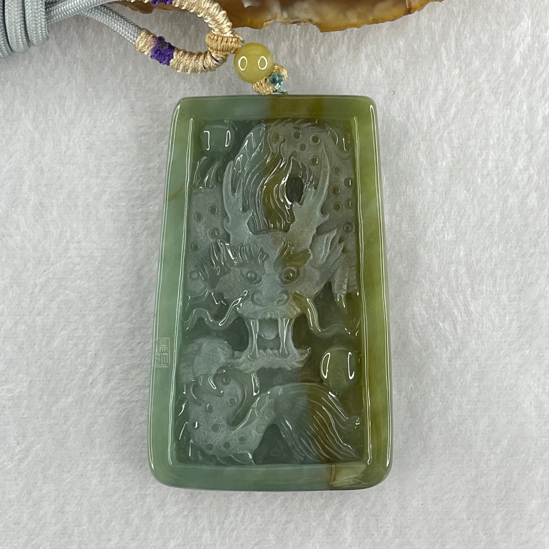 Grand Master Type Green with Brownish Yellow Jadeite Shan Shui with Gui Ren with Dragon Pendant 62.97g 67.6 by 41.8 by 9.5mm - Huangs Jadeite and Jewelry Pte Ltd