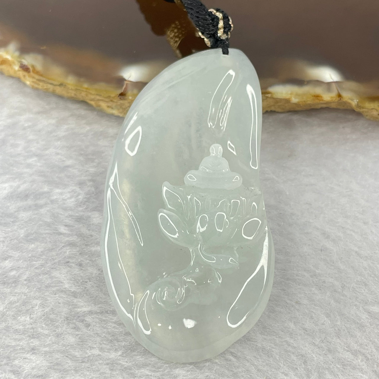 Type A Semi Icy Light Green Jadeite Benefactor on Lotus Flower Pendent 16.22g 52.1 by 26.5 by 7.9mm - Huangs Jadeite and Jewelry Pte Ltd