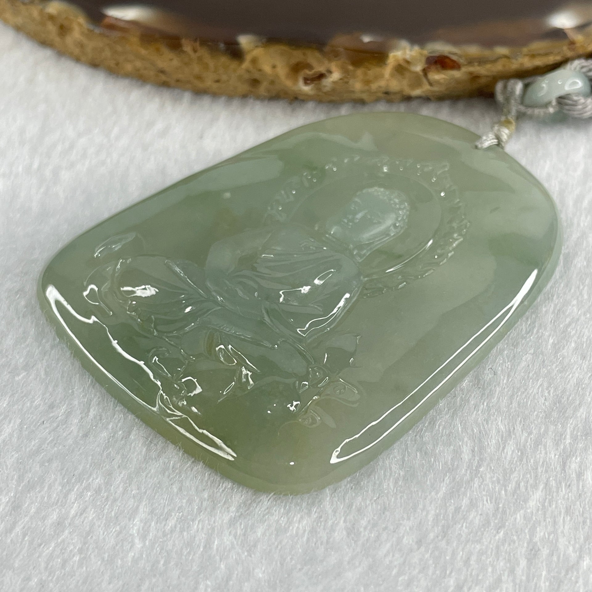 Type A Icy Light Green Jadeite Buddha Pendant 34.74g 61.3 by 48.3 by 5.5mm - Huangs Jadeite and Jewelry Pte Ltd