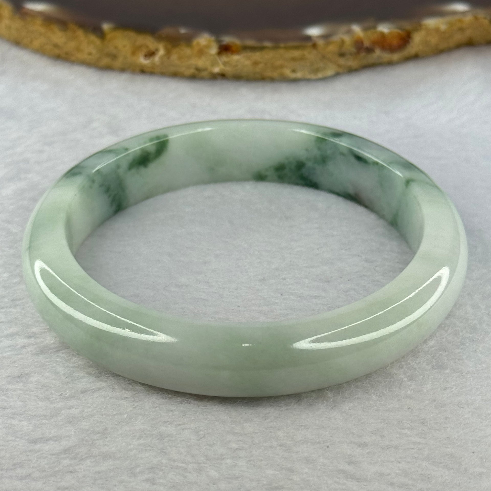 Type A Light Green with Green Piao Hua and Brown Spot Jadeite Bangle Internal Diameter 58.7mm 55.08g 12.4 by 8.5mm (Close to Perfect) - Huangs Jadeite and Jewelry Pte Ltd