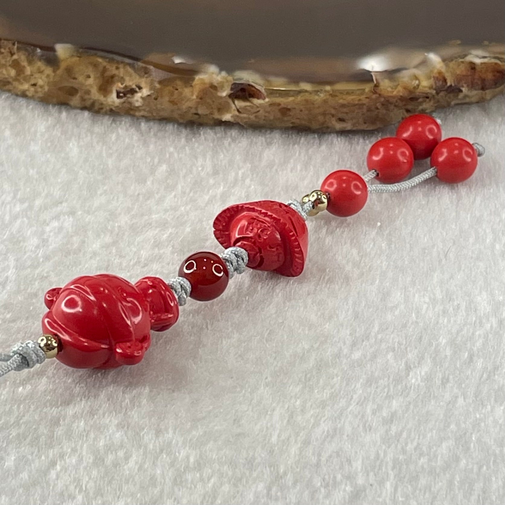 Natural Red Cinnabar Baby God of Fortune 16.0 by 16.8 by 11.3mm with Ingot Yuan Bao 9.0 by 13.06 by 9.1mm and Beads 6.54g - Huangs Jadeite and Jewelry Pte Ltd