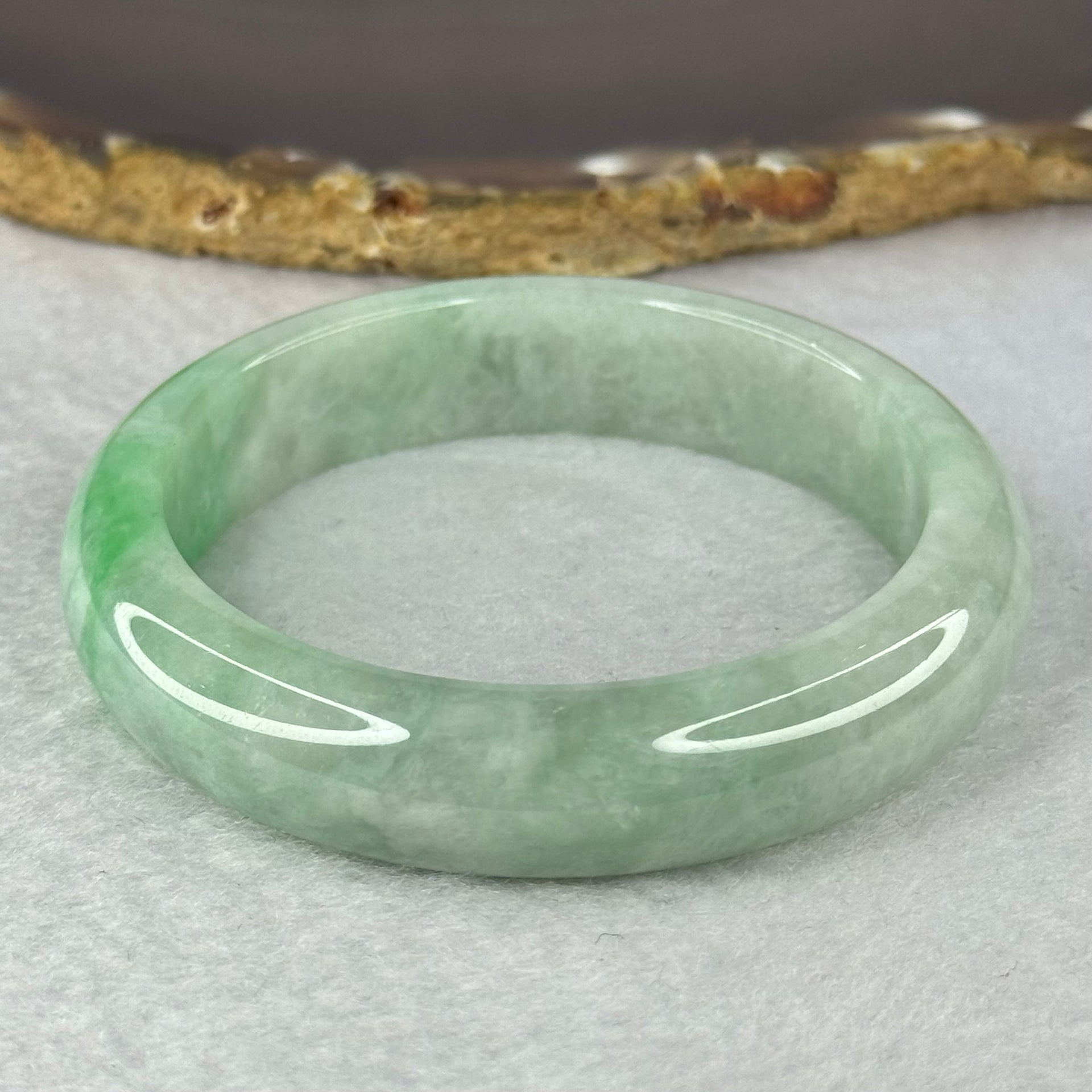 Type A Green with Apple Green Patches Jadeite Bangle 56.91g Inner Diameter 54.8mm 13.6 by 8.3mm (Slight Internal Lines) - Huangs Jadeite and Jewelry Pte Ltd