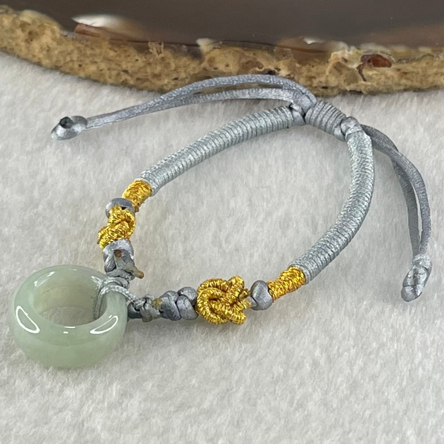 Type A Light Blueish Green Jadeite Ping An Kou String Bracelet 3.13g 15.3 by 6.7mm - Huangs Jadeite and Jewelry Pte Ltd