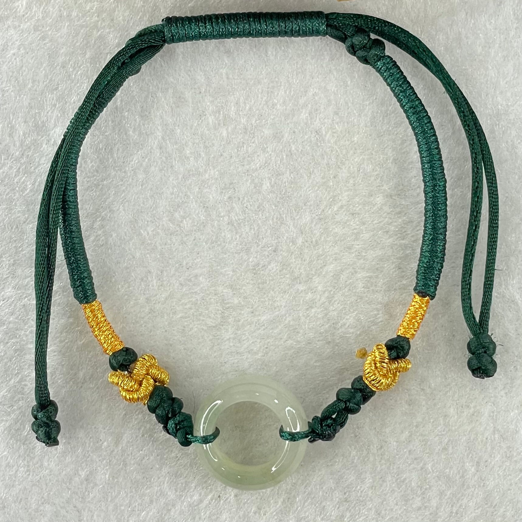 Type A Faint Green Jadeite Ping An Kou String Bracelet 2.98g 15.1 by 6.5mm - Huangs Jadeite and Jewelry Pte Ltd