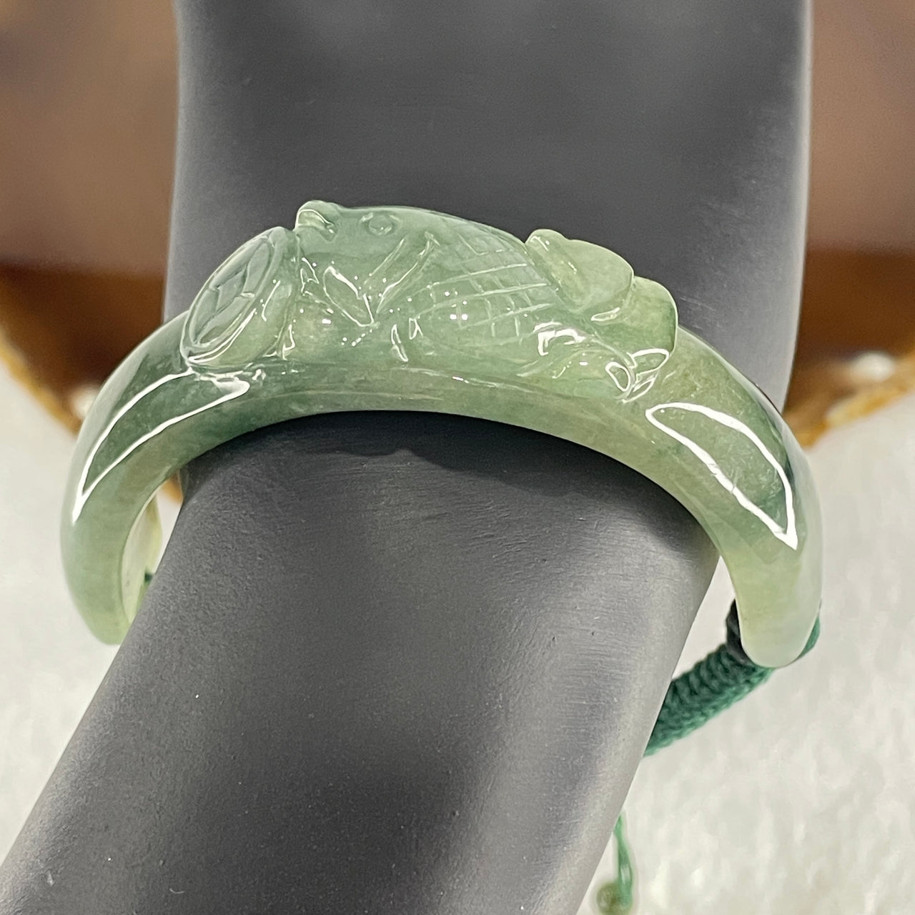 Natural Type A Jelly Green with Dark Green Piao Hua Jadeite Carp Fish with Coin Bracelet 37.48g 16cm 14.0 by 11.8mm