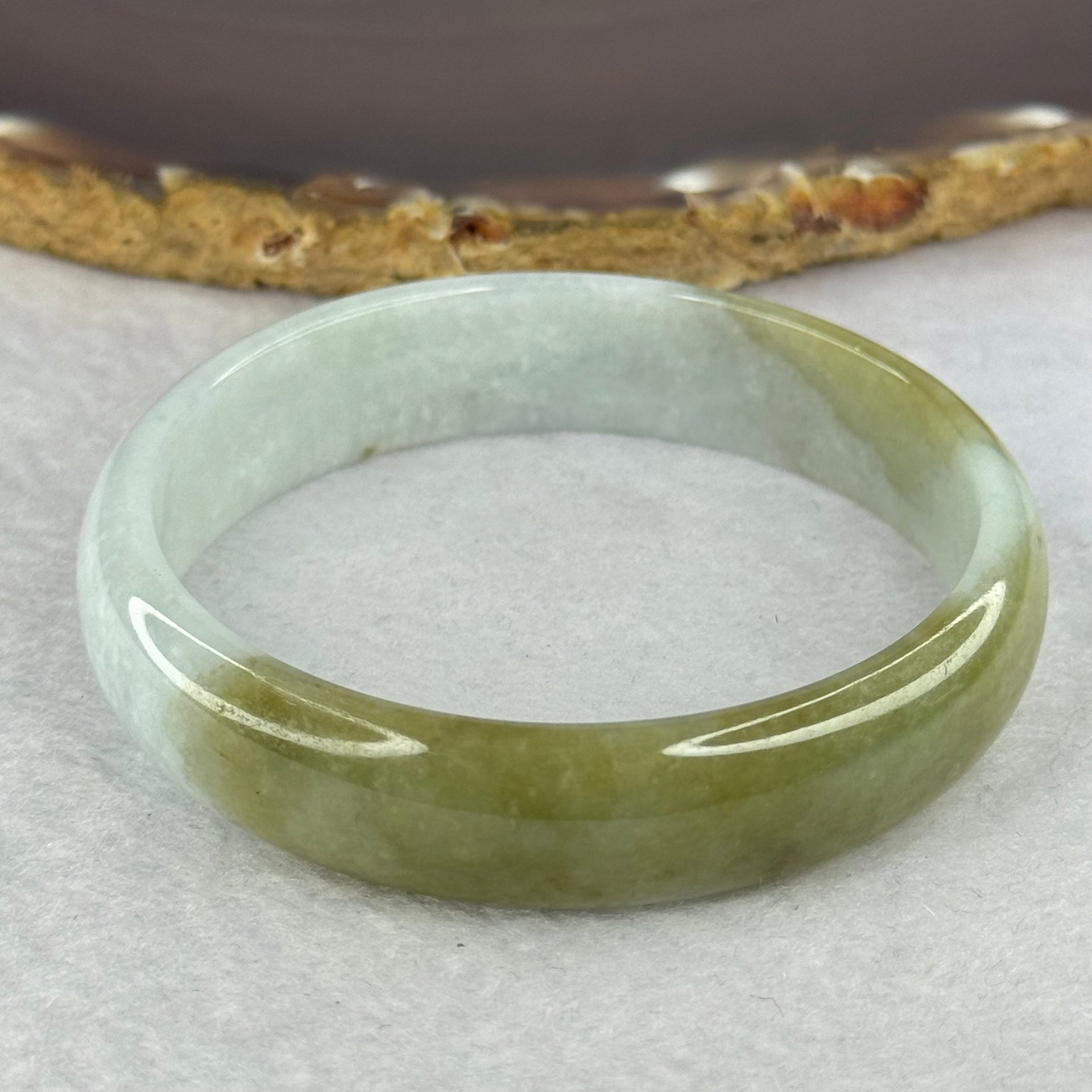 Type A Light Lavender with Brownish Green Patches 57.92g Inner Diameter 57.4mm 13.6 by 13.6 by 5.6mm - Huangs Jadeite and Jewelry Pte Ltd