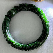 Type A Translucent to Opaque Old Mine Spicy Green Jadeite Dragon Bangle Internal Diameter 56.30mm 374.20cts 74.75g 16.0 by 12.5mm With NGI Cert 32885979 (Slight Internal Lines) - Huangs Jadeite and Jewelry Pte Ltd