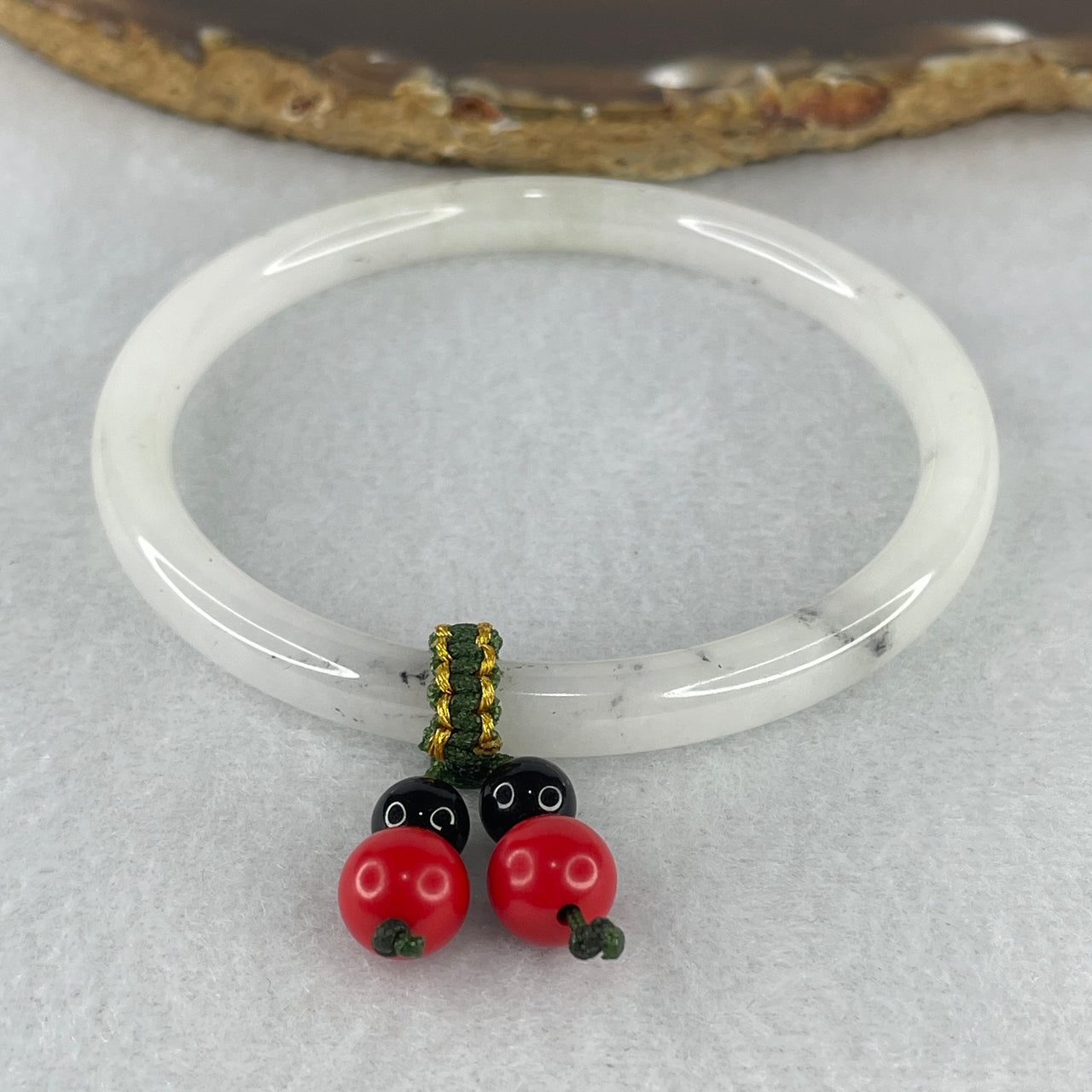 Certified Natural Type A Colorless to Faint Green with Wuji Grey Piao Hua Jadeite Bangle with Dangling Charm | Sleek Fine-Strand Round Court Silhouette | (23.43g 6.6x5.8mm | 57.9mm Inner Diameter | Close to Perfect)