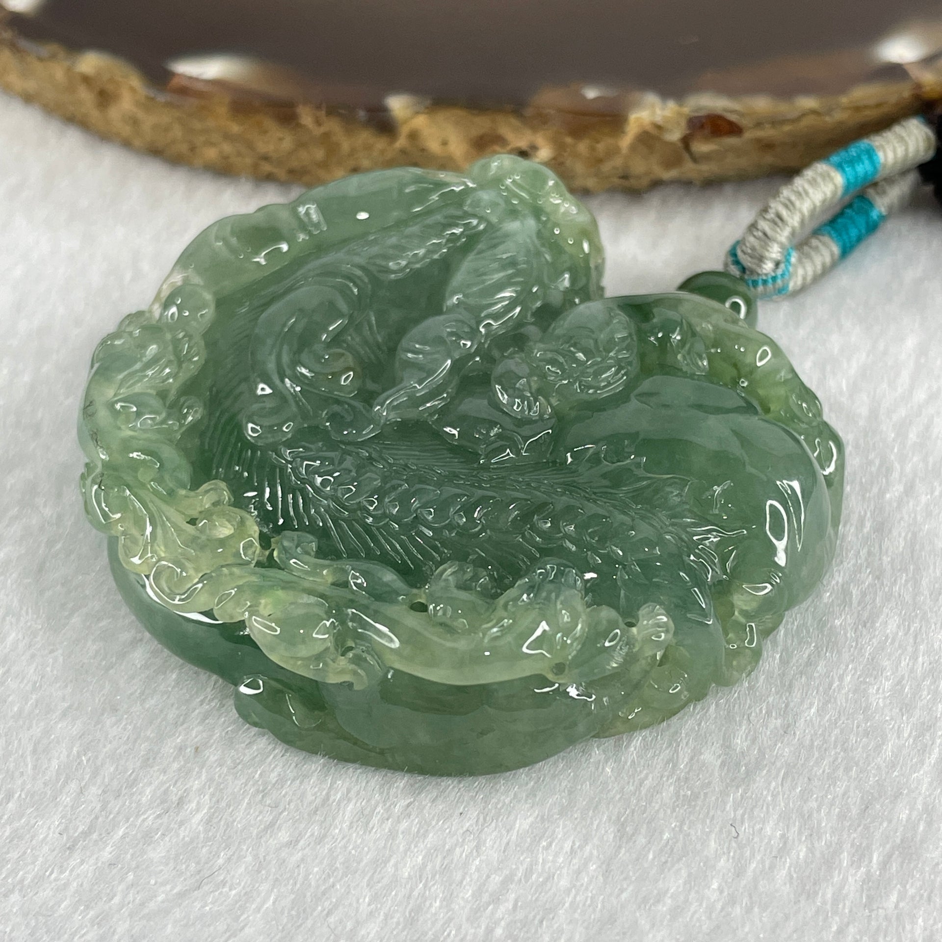 Grand Master Type A Semi Icy Light Green Jadeite Pixiu with 3 Baby Pixiu Double Side Pendant 75.67g 49.0 by 53.5 by 13.3mm - Huangs Jadeite and Jewelry Pte Ltd