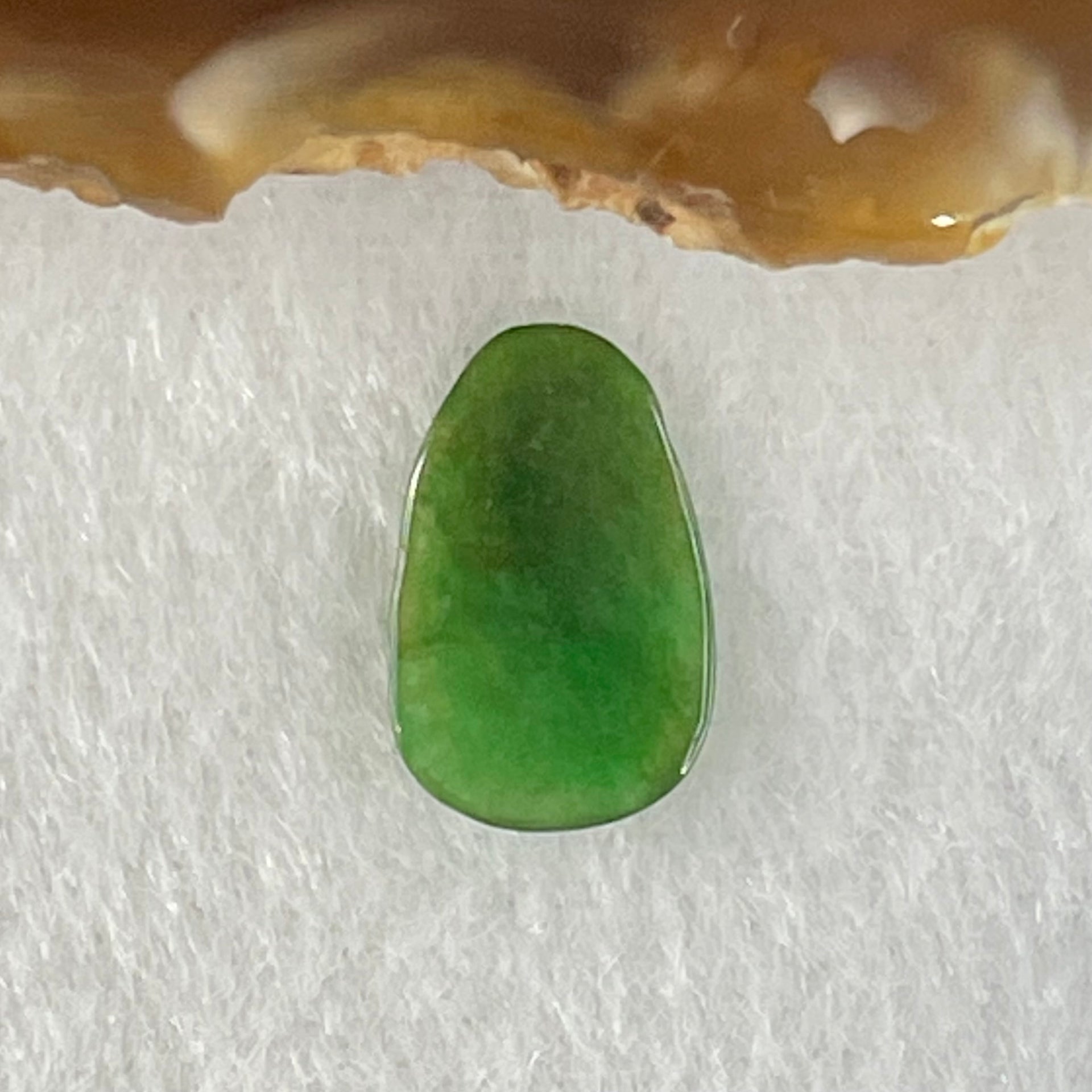 Type A Old Mine Spicy Green Jadeite Ruyi Charm Stone For Setting 0.41g 13.8 by 8.8 by 1.6mm - Huangs Jadeite and Jewelry Pte Ltd