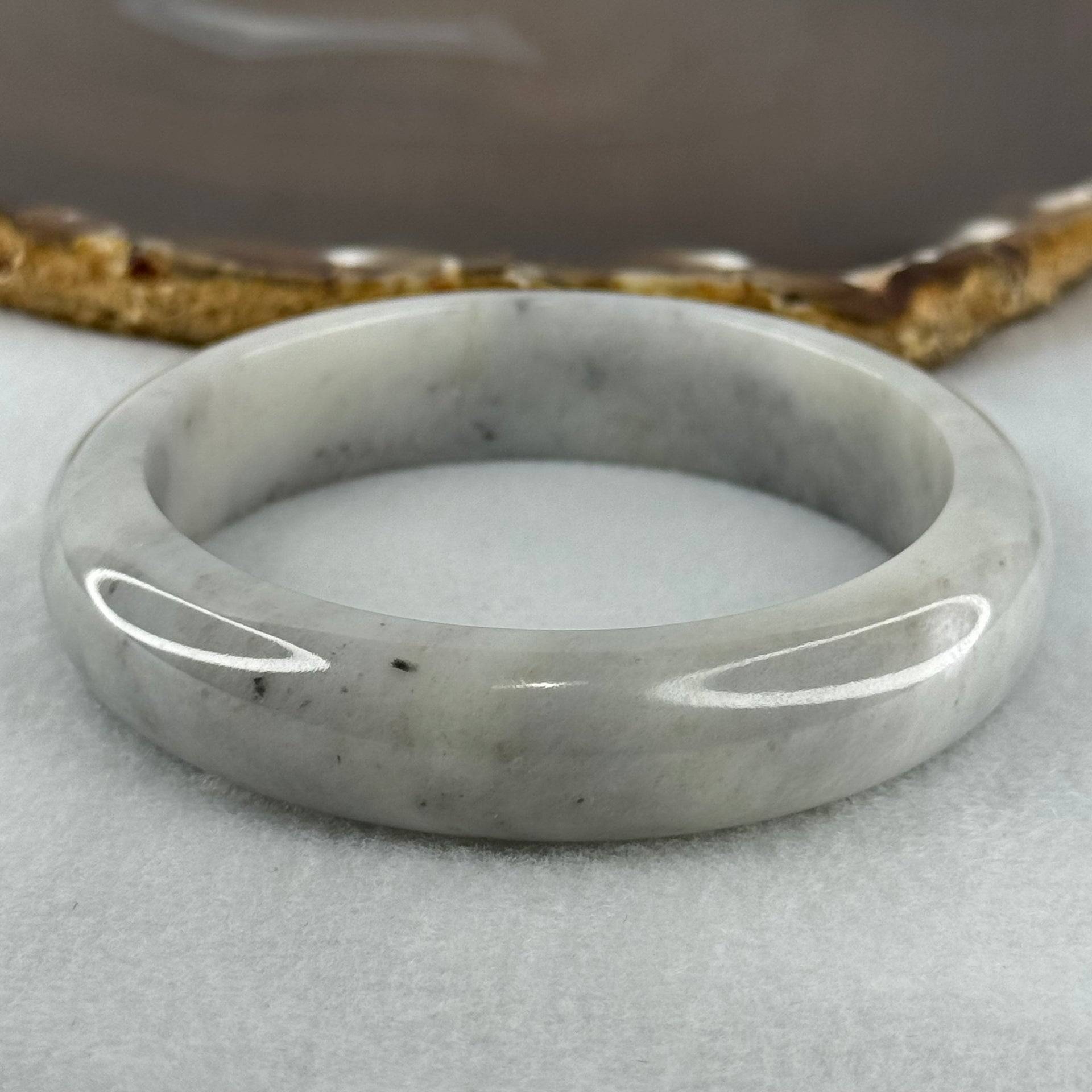 Type A Faint Green Grey Wuji Piao Hua Jadeite Bangle Internal Diameter 58.8mm 68.72g 14.6 by 8.8mm (Very Slight Internal Lines) - Huangs Jadeite and Jewelry Pte Ltd