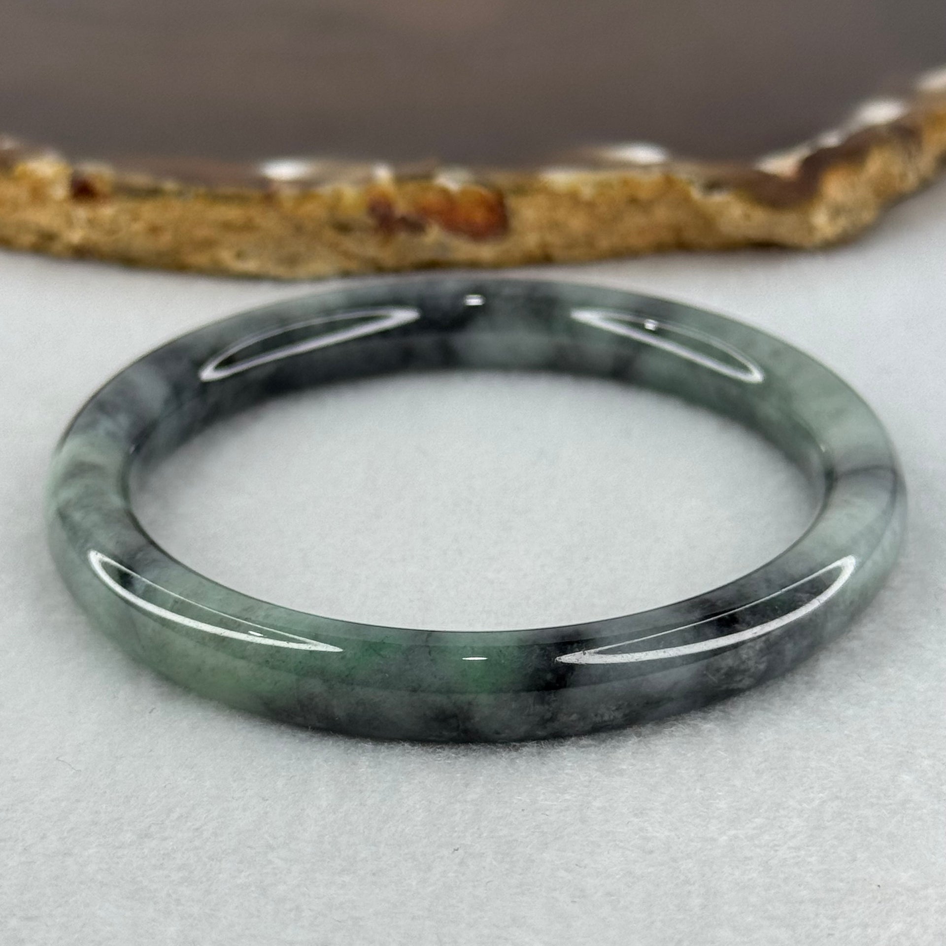 Type A Wuji Grey Black with Light Green Patch Jadeite Bangle Internal Diameter 52.2mm 27.55g 8.0 by 7.0mm - Huangs Jadeite and Jewelry Pte Ltd