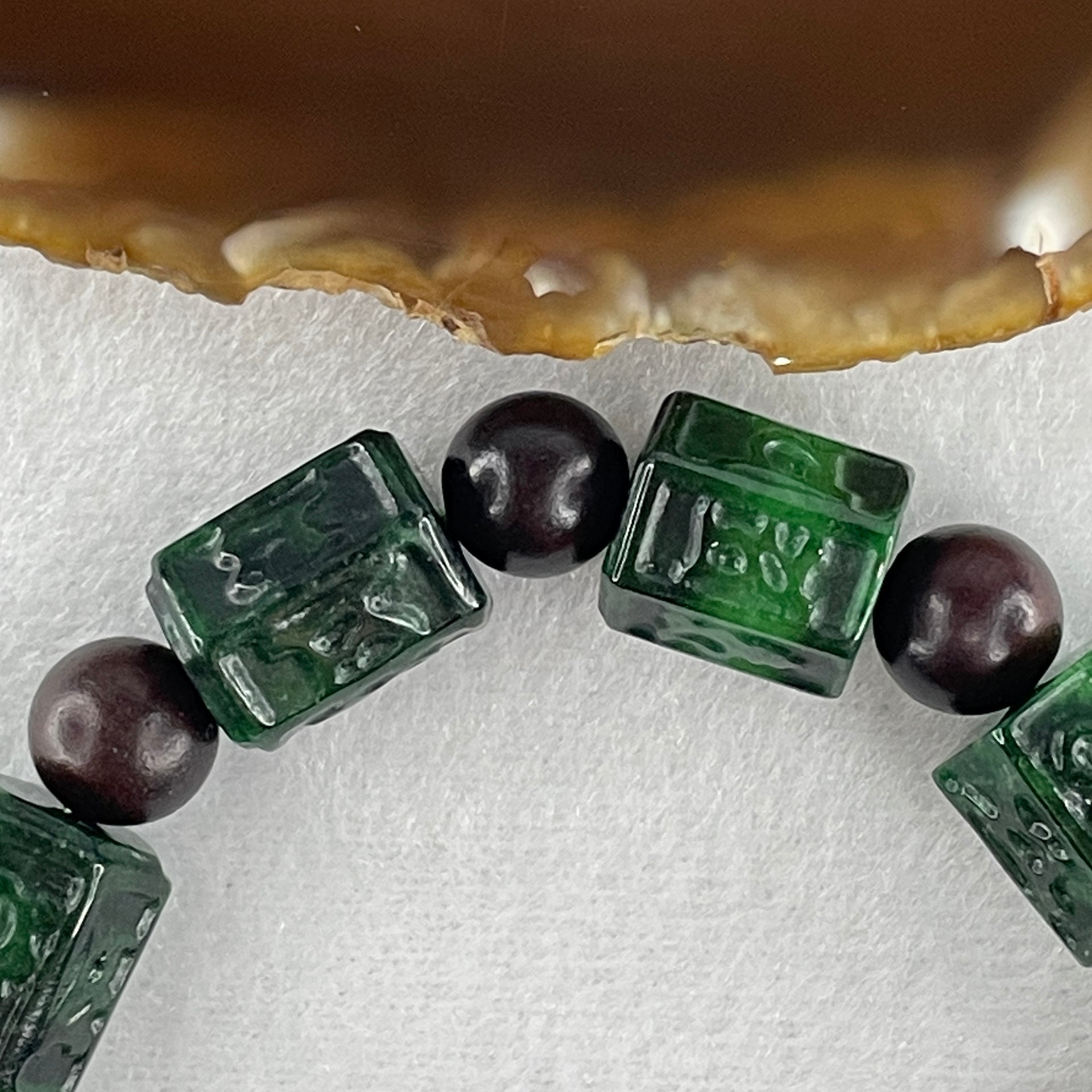 Type A Old Mine Spicy Green Jadeite Om Mani Padme Hum Barrel with Wood Beads Bracelet 55.97g 18cm 12.2 by 13.8mm - Huangs Jadeite and Jewelry Pte Ltd