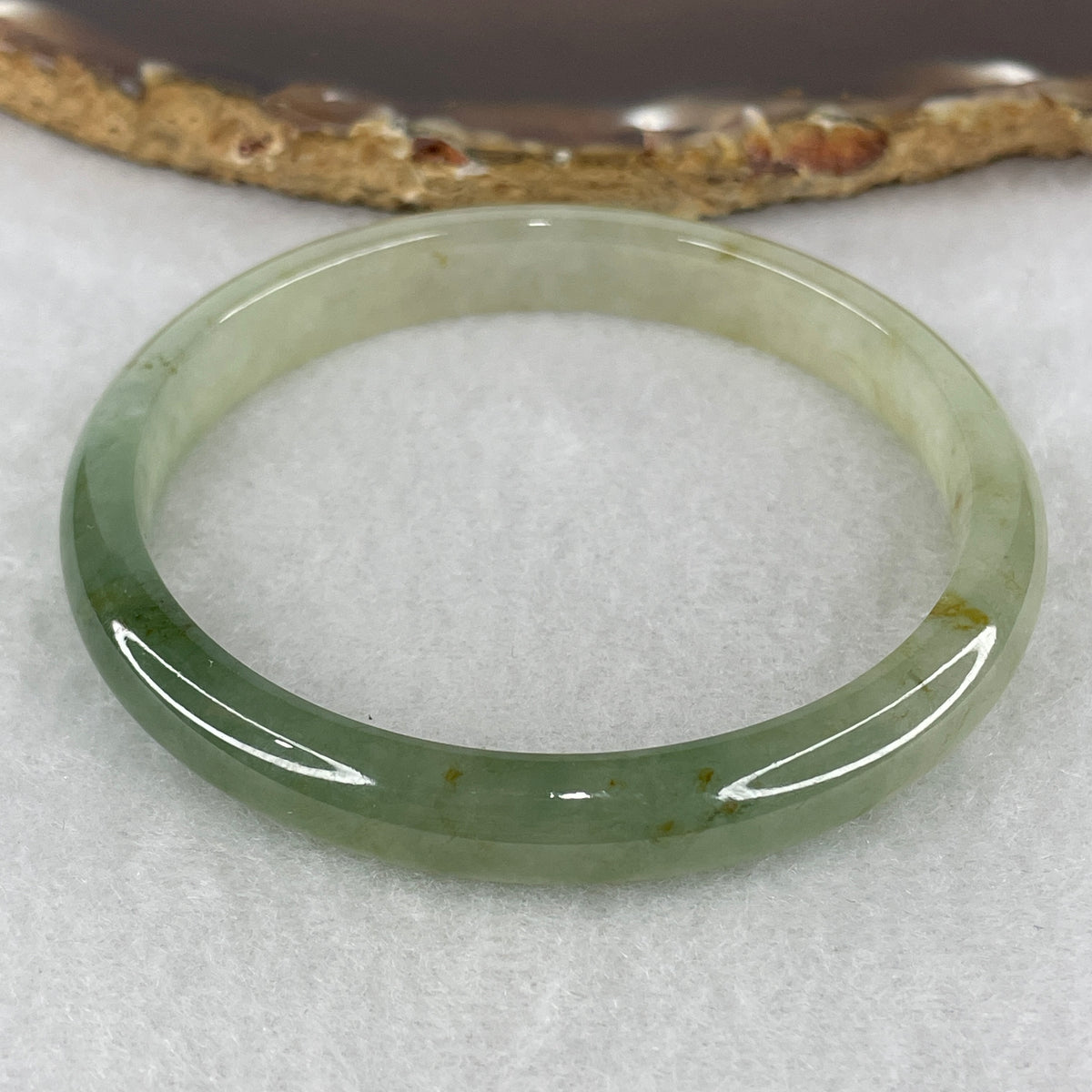 NGI Certified Natural Type A Near Colorless with Blueish Green Patches Jadeite Bangle | 56.96mm External 69.28mm Inner Diameter (28.70g / 143.73ct | Heart & Crown Chakra Harmony, Serene Wealth & Peace Shield)