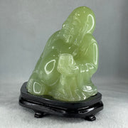 Natural Green Serpentine Siting Milo Buddha with Wealth Pot with Wooden Stand Display 1362.0g 165.0 by 110.0 by 150.0mm - Huangs Jadeite and Jewelry Pte Ltd