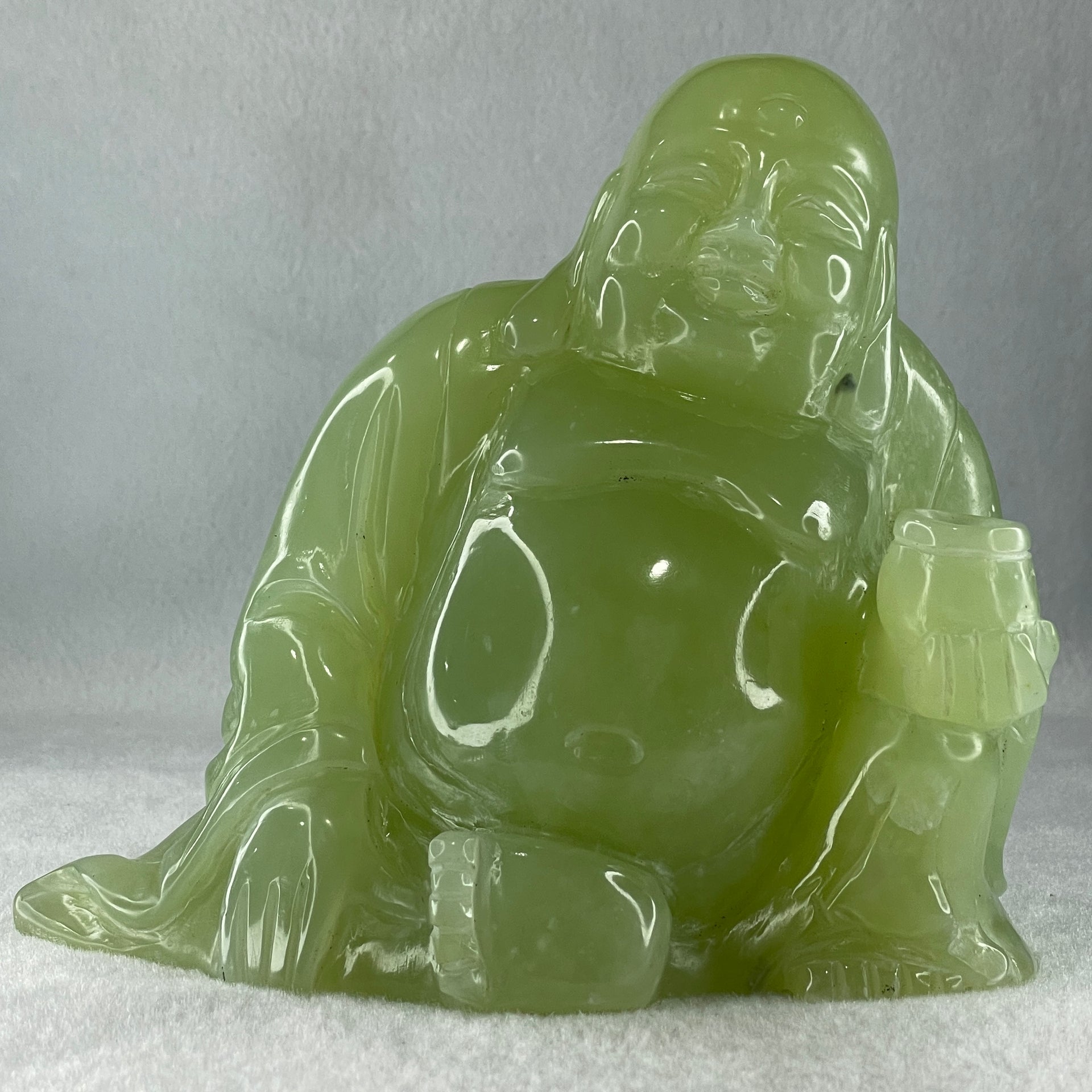 Natural Green Serpentine Siting Milo Buddha with Wealth Pot with Wooden Stand Display 1362.0g 165.0 by 110.0 by 150.0mm - Huangs Jadeite and Jewelry Pte Ltd