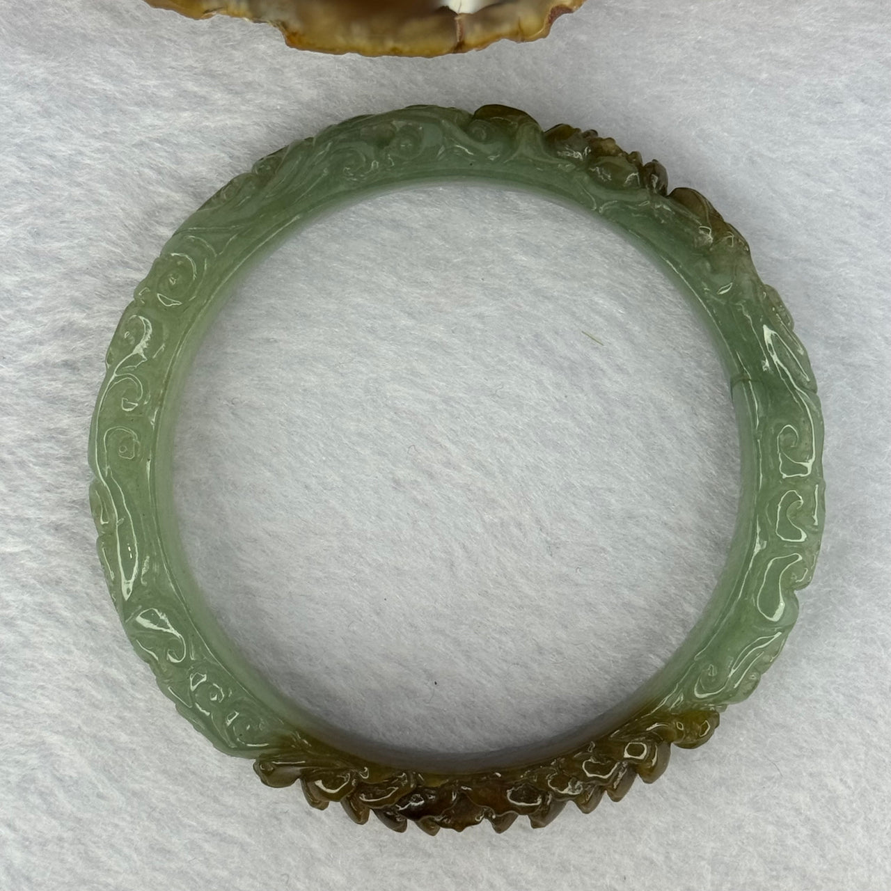 Type A Blueish Green and Brown Patches Jadeite Lotus Flowers Bangle 39.19g Internal Diameter 55.2mm 10.9 by 8.2mm - Huangs Jadeite and Jewelry Pte Ltd