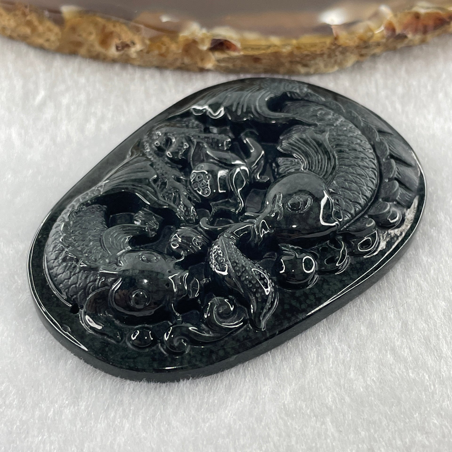 Type A Opaque to Partial Translucent Black Omphacite Jadeite Double Fish with Lotus Flower and Coins Pendant 29.11g 61.1 by 44.1 by 9.2mm - Huangs Jadeite and Jewelry Pte Ltd