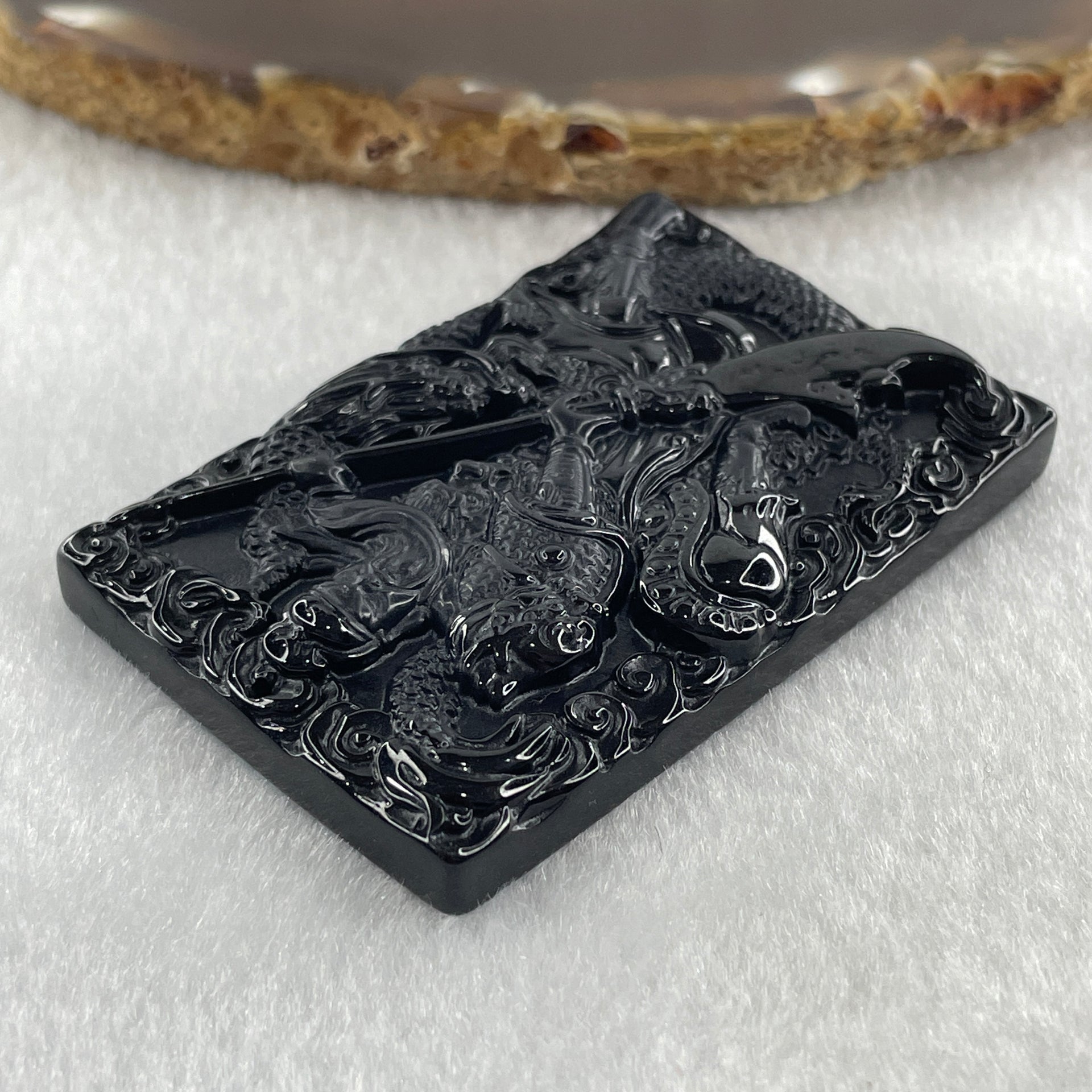 Type A Opaque to Partial Translucent Black Omphacite Jadeite Guan Gong with Dragon Pendant 26.12g 57.7 by 38.8 by 7.8mm - Huangs Jadeite and Jewelry Pte Ltd