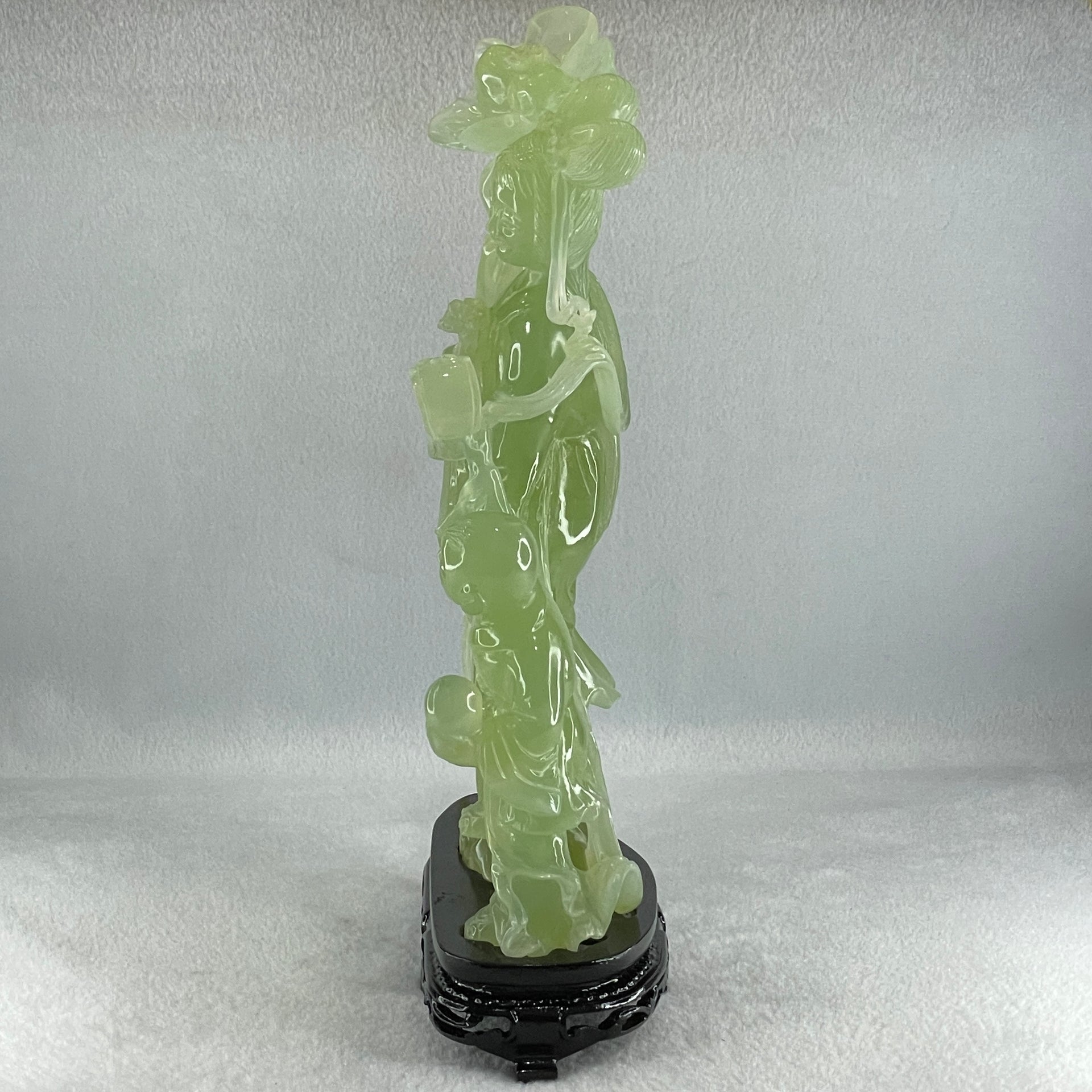 Natural Semi Icy Green Serpentine Fairy with Tong Zhi and Lotus Flower with Wooden Stand Display 1,228.0g 196.0 by 76.0 by 283.0mm - Huangs Jadeite and Jewelry Pte Ltd