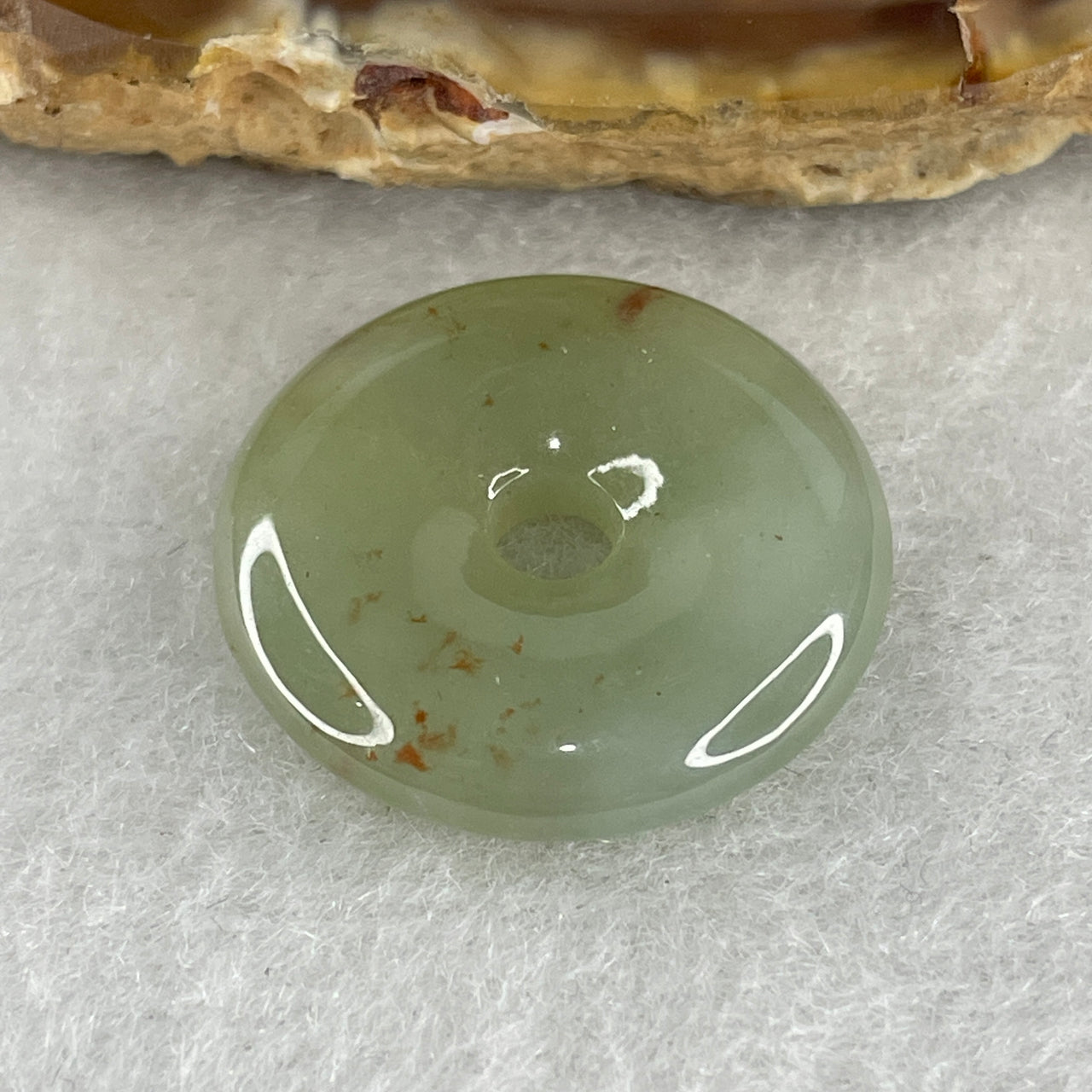 Natural Type A Semi-Icy Blueish Green Jadeite Pendant | Ping An Kou Donut with Earthy Brown Patches (4.48g, 21.2x4.8mm)