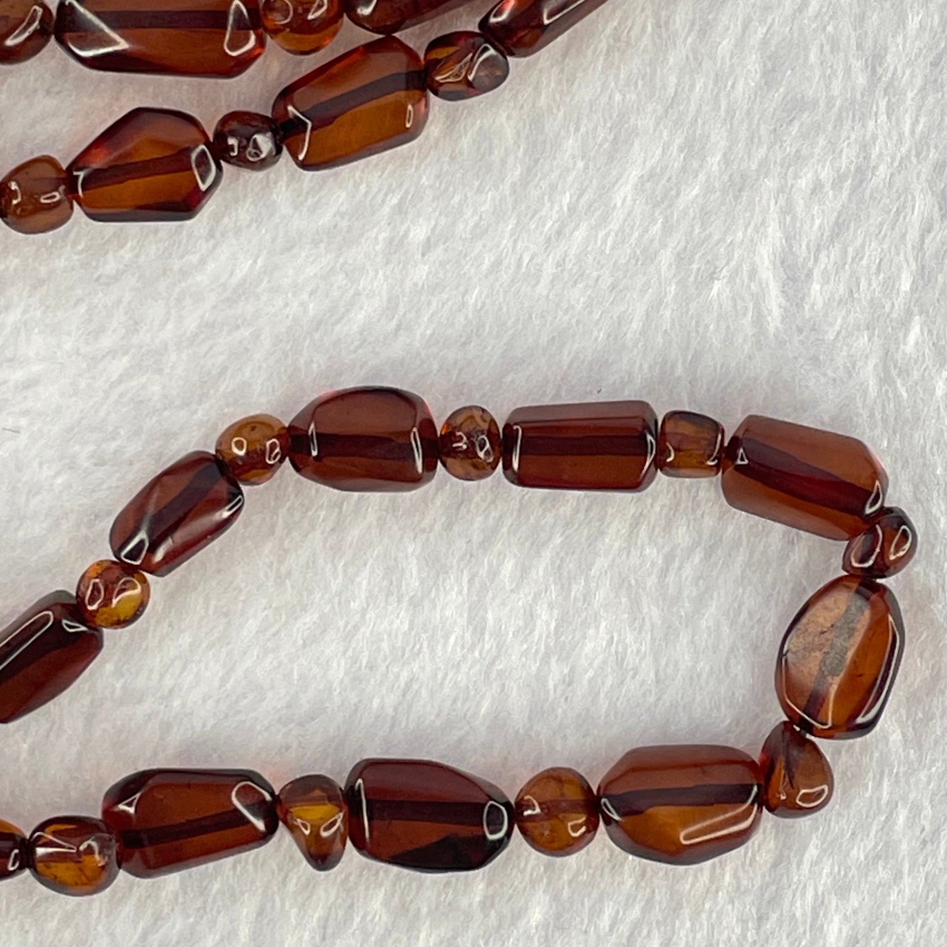 Natural Tea Color Blood Amber Irregular Beads Necklace 天然茶色血珀项链 14.99g 10.3 by 6.5 by 5.2mm 37pcs - Huangs Jadeite and Jewelry Pte Ltd