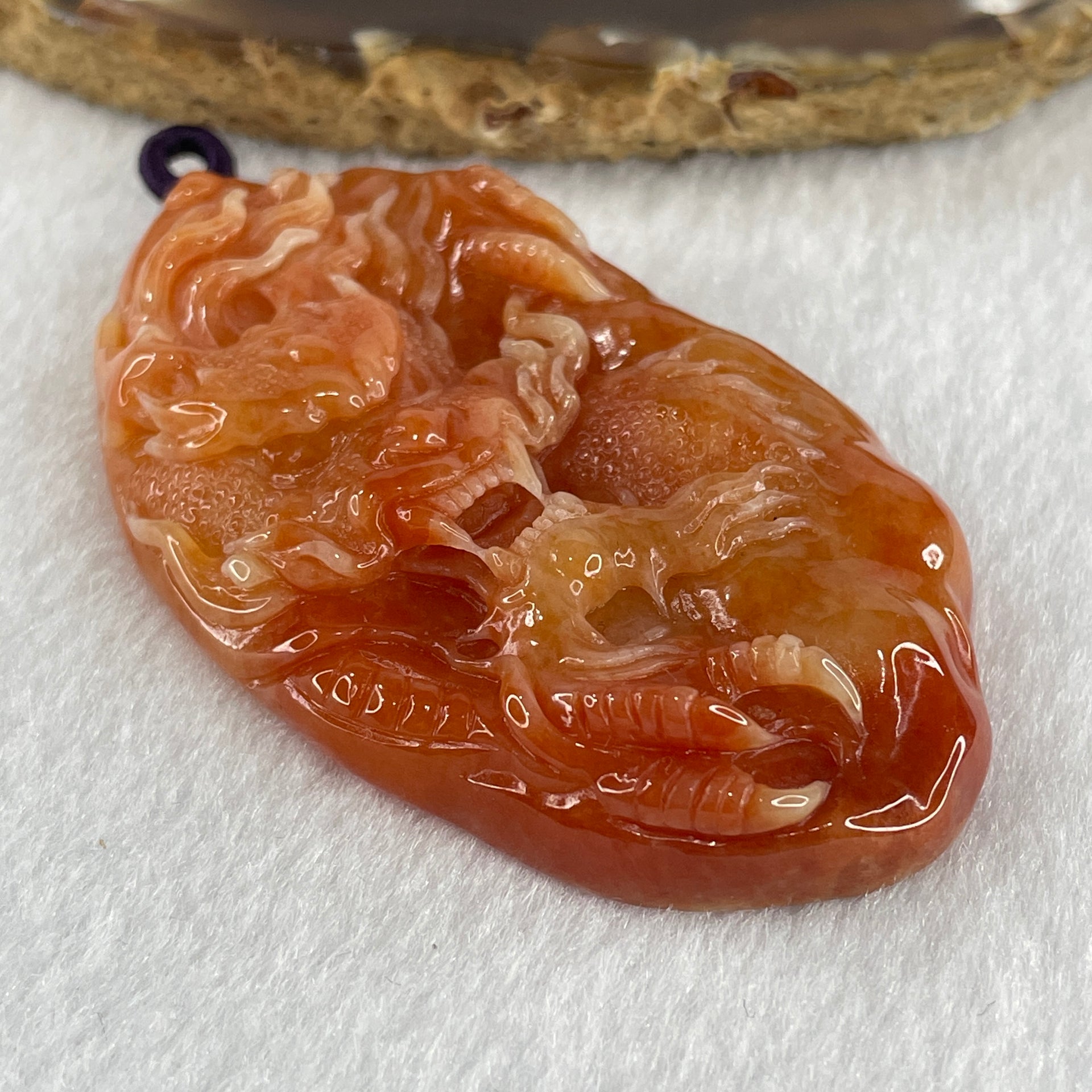 Type A Brownish Red Jadeite Dragon Double Side Pendant 55.34g 66.4 by 39.8 by 12.3mm - Huangs Jadeite and Jewelry Pte Ltd