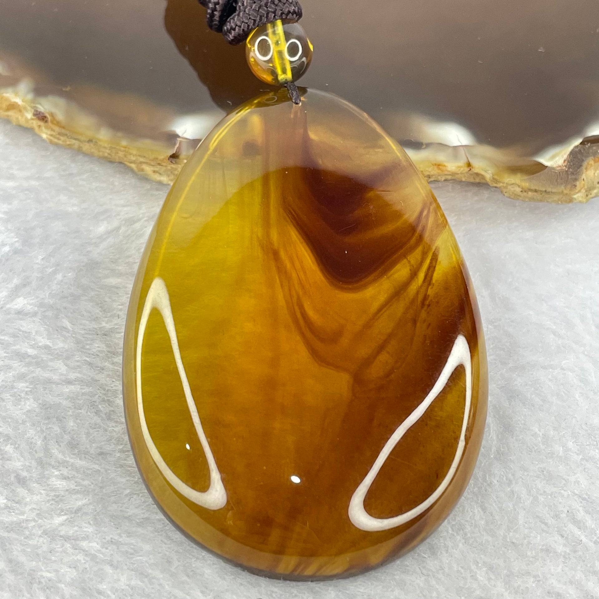 Natural Cognac with Red Amber Pendent 15.33g 65.3 by 46.3 by 14.0mm - Huangs Jadeite and Jewelry Pte Ltd