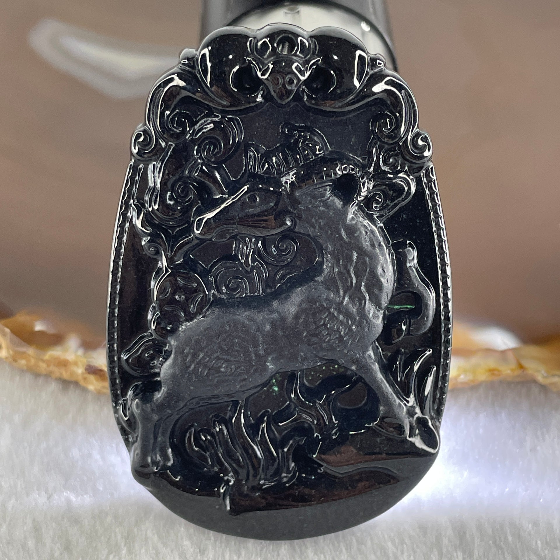 Type A Opaque to Partial Translucent Black Omphacite Jadeite Goat Pendant 27.85g 59.9 by 40.6 by 9.8mm - Huangs Jadeite and Jewelry Pte Ltd