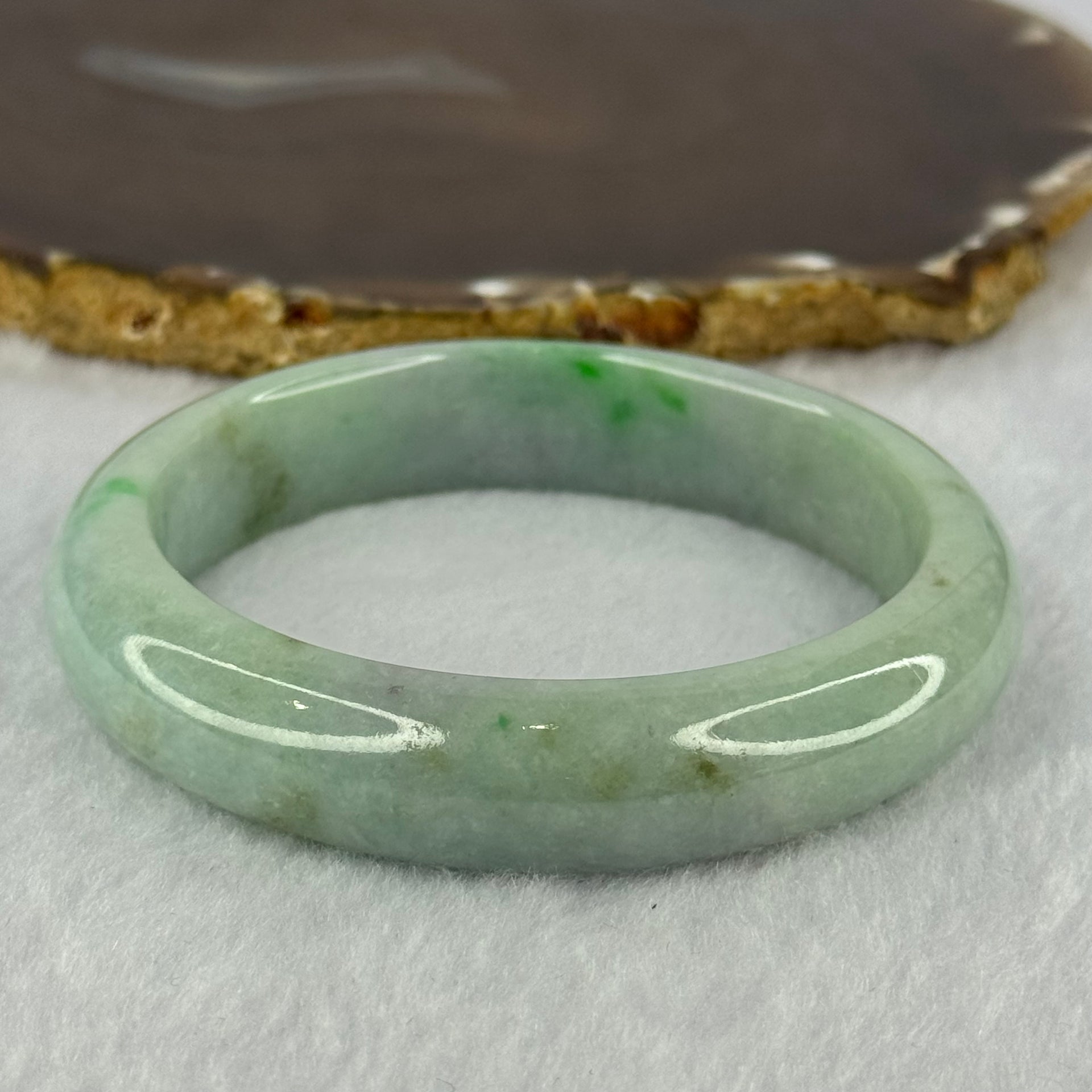 Type A Light Green with Bright Green Patches Jadeite Bangle 78.00g Internal Diameter 61.7mm 14.5 by 9.9mm (Very Slight External Rough) - Huangs Jadeite and Jewelry Pte Ltd