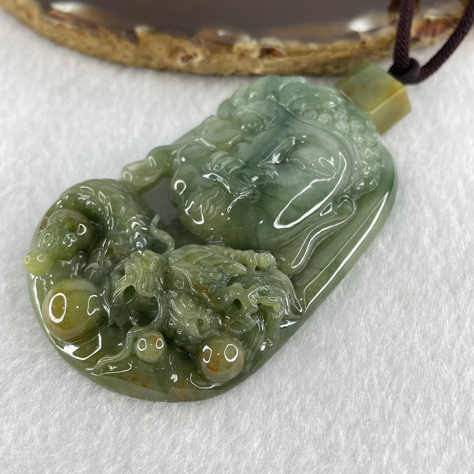 Natural Type A Blueish Green with Light Brown Jadeite Good Vs Evil (Buddha Vs Devil) with Dragon 80.23g 68.0 by 43.7 by 12.3mm - Huangs Jadeite and Jewelry Pte Ltd