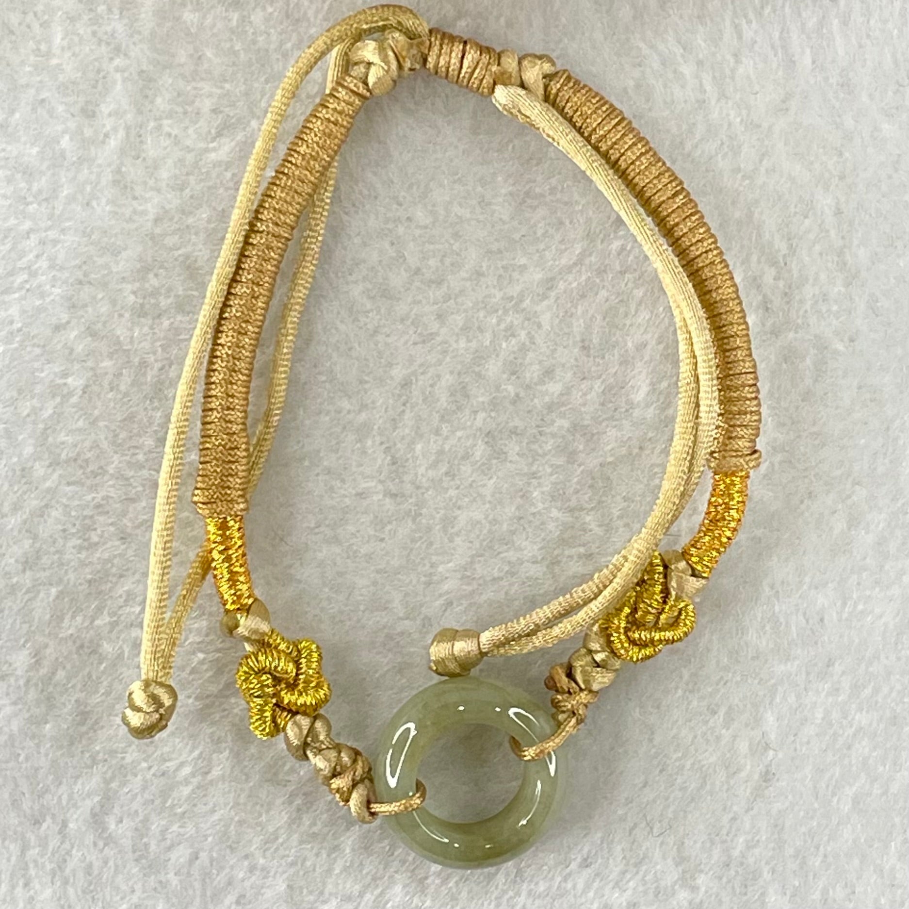 Type A Blueish Green with Brown Jadeite Ping An Kou String Bracelet 2.98g 15.2 by 5.7mm - Huangs Jadeite and Jewelry Pte Ltd