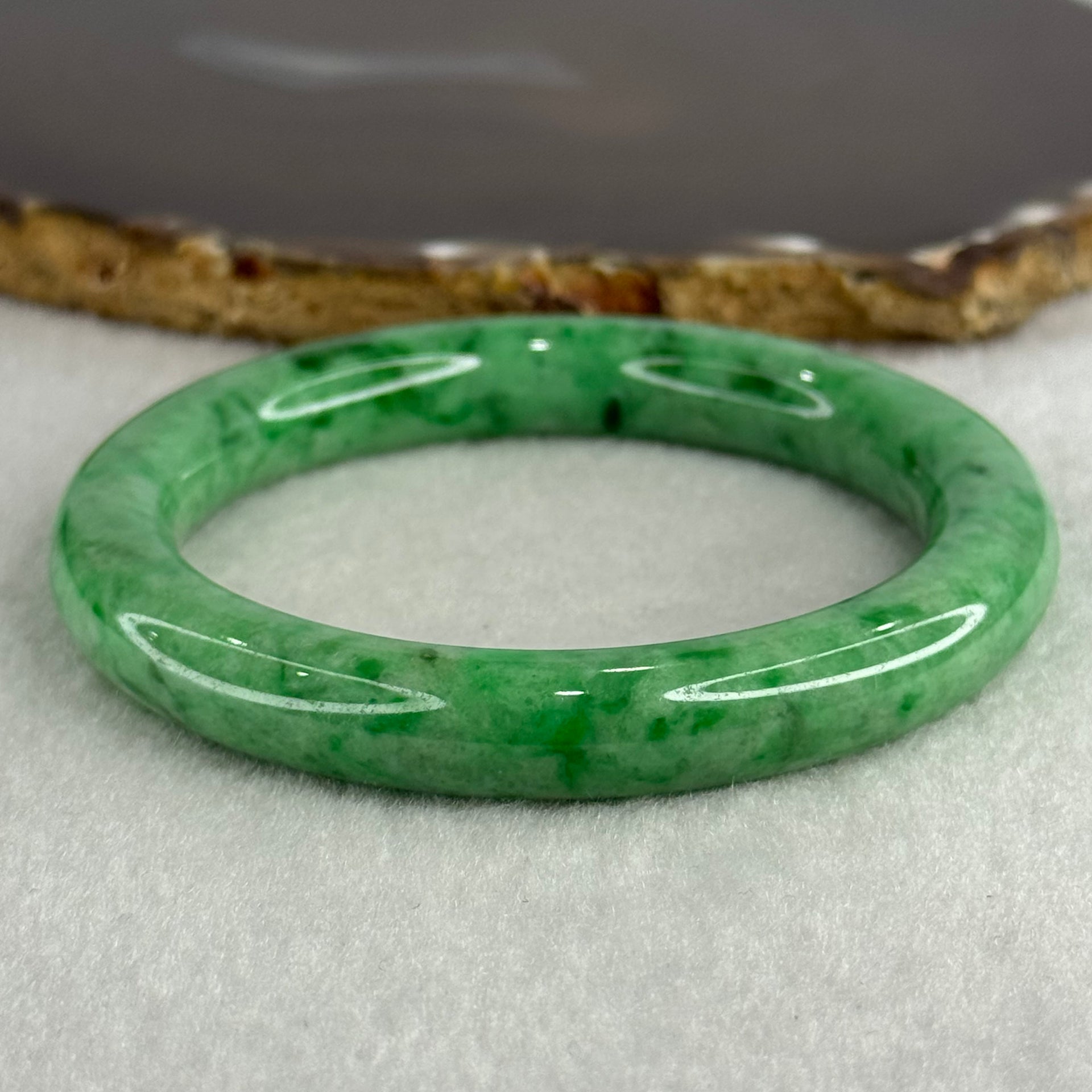 Type A Apple Green Jade Jadeite Bangle 60.77g Inner Diameter: 59.2mm Thickness: 10.2 by 10.4mm (Very Very Slight Internal Lines) - Huangs Jadeite and Jewelry Pte Ltd