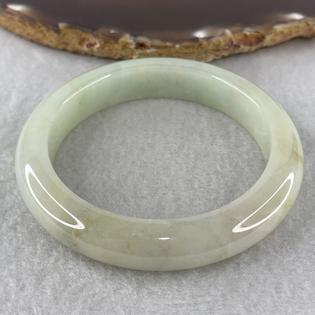 Natural Type Light Green Jadeite Bangle 58.51g Inner Diameter 55.6mm 11.8 by 9.4mm (Internal Line) - Huangs Jadeite and Jewelry Pte Ltd