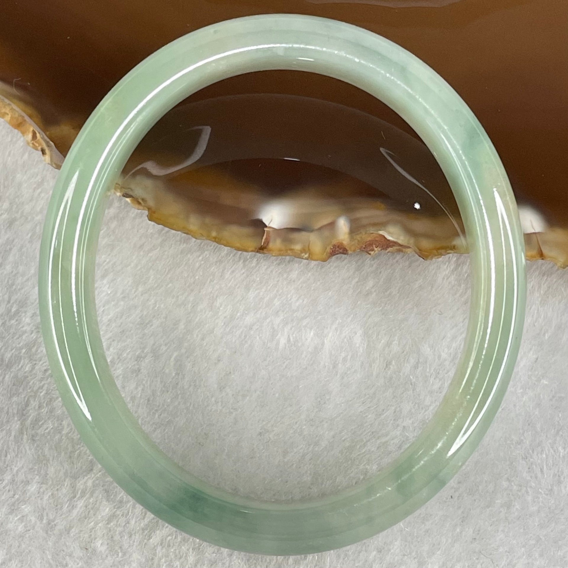 Type A Jelly Green Jadeite Oval Bangle 32.70g Internal Diameter 54.6mm 10.2 by 6.4mm (Close to Perfect) - Huangs Jadeite and Jewelry Pte Ltd