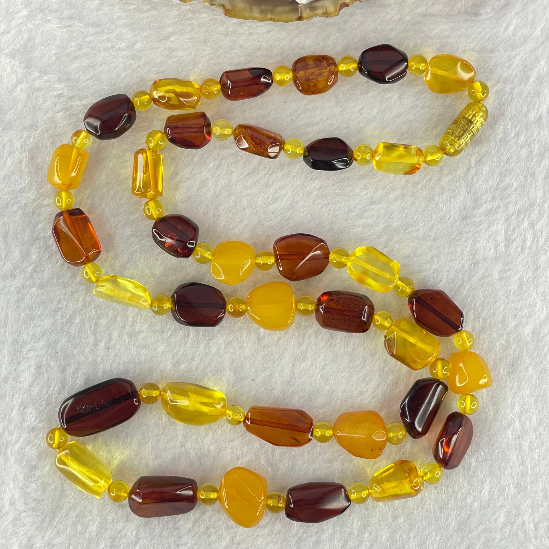 Natural Mixed Color Amber Beads Necklaces 18.16g 60cm 18.8 by 10.2 by 4.8mm, 11.2 by 7.1 by 5.5mm 35pcs - Huangs Jadeite and Jewelry Pte Ltd