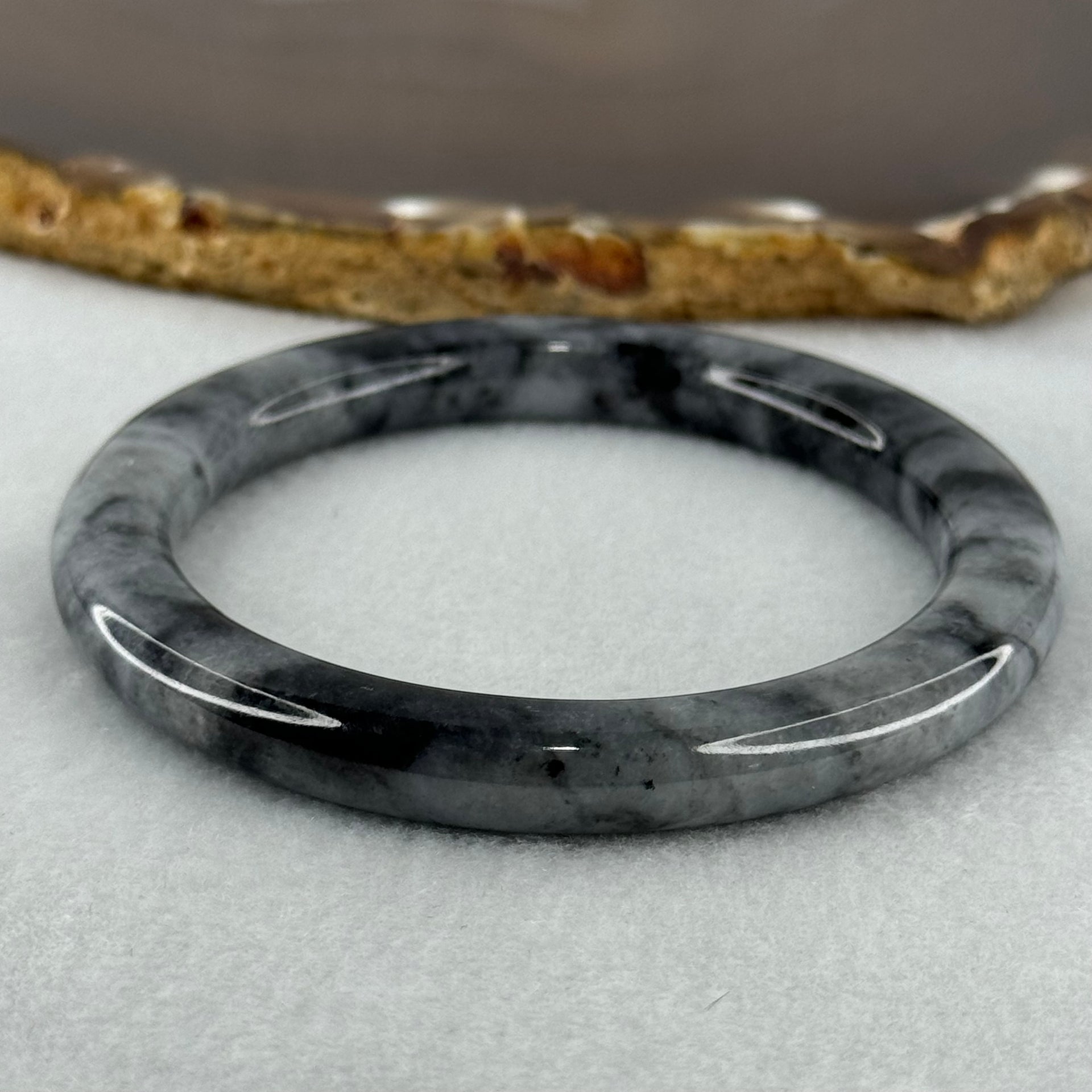 Type A Wuji Grey Black Piao Hua Jadeite Bangle Internal Diameter 55.4mm 39.68g 7.9 by 9.4mm (Slight Internal Lines) - Huangs Jadeite and Jewelry Pte Ltd