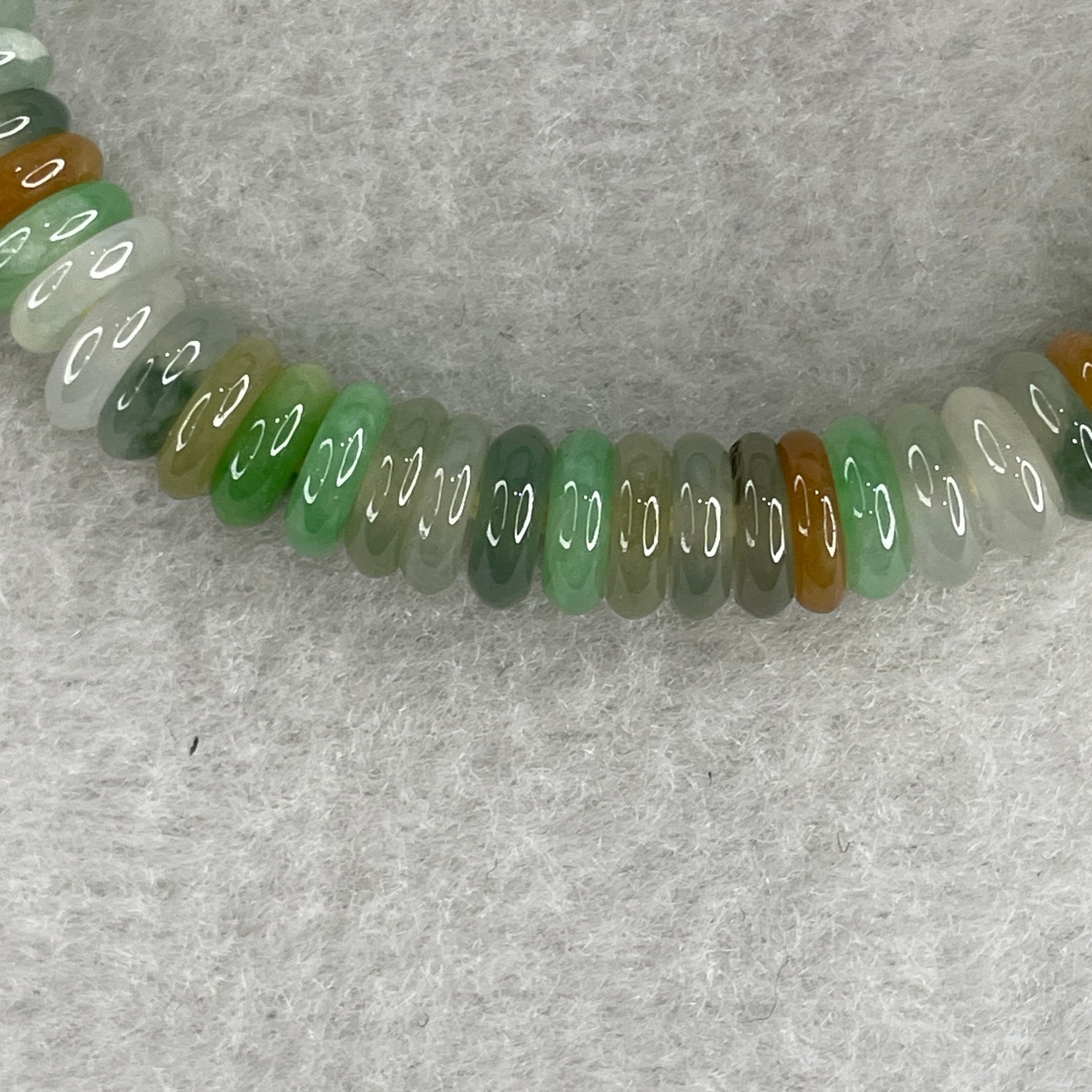 Natural Type A Muti Color Green with Yellow Blueish Green Colorless Jadeite Donut Beads Bracelet 19.89g 16cm 7.1mm 80 Pcs - Huangs Jadeite and Jewelry Pte Ltd