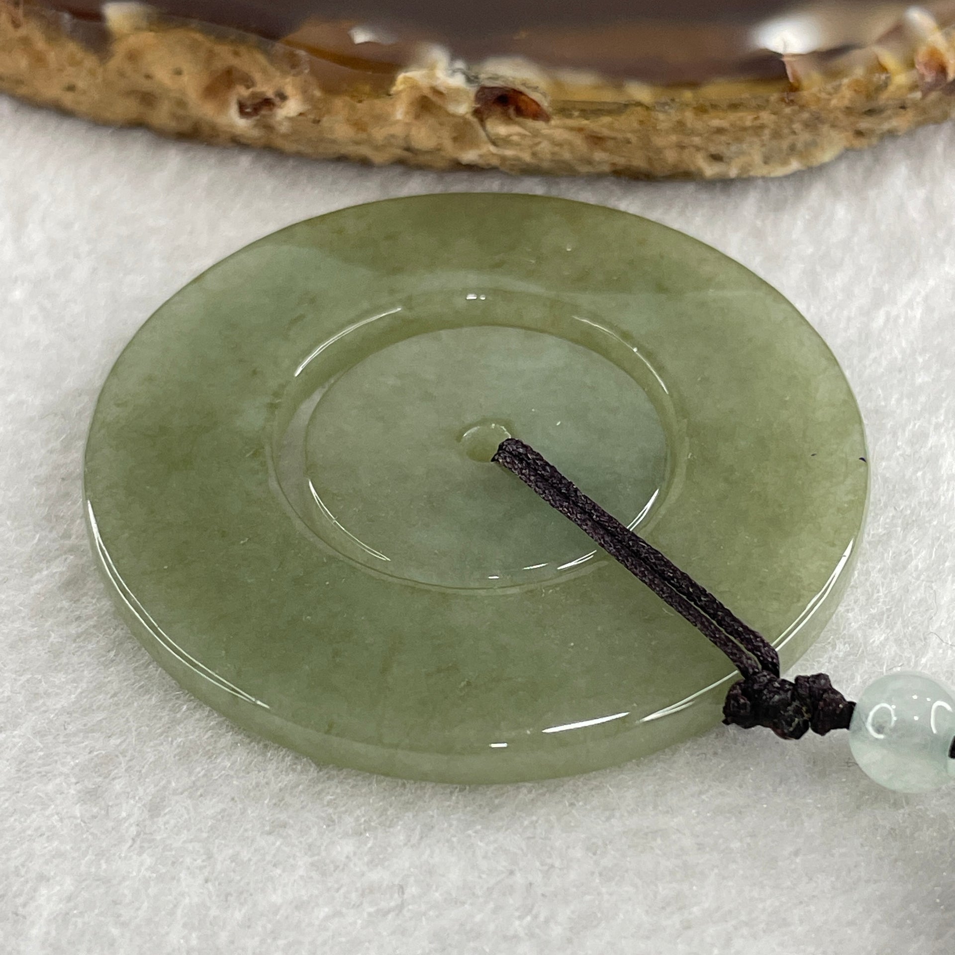 Natural Type A Green with Brownish Jadeite Double Ping An Kou Donut Pendant 20.64g 44.9 by 3.4mm - Huangs Jadeite and Jewelry Pte Ltd