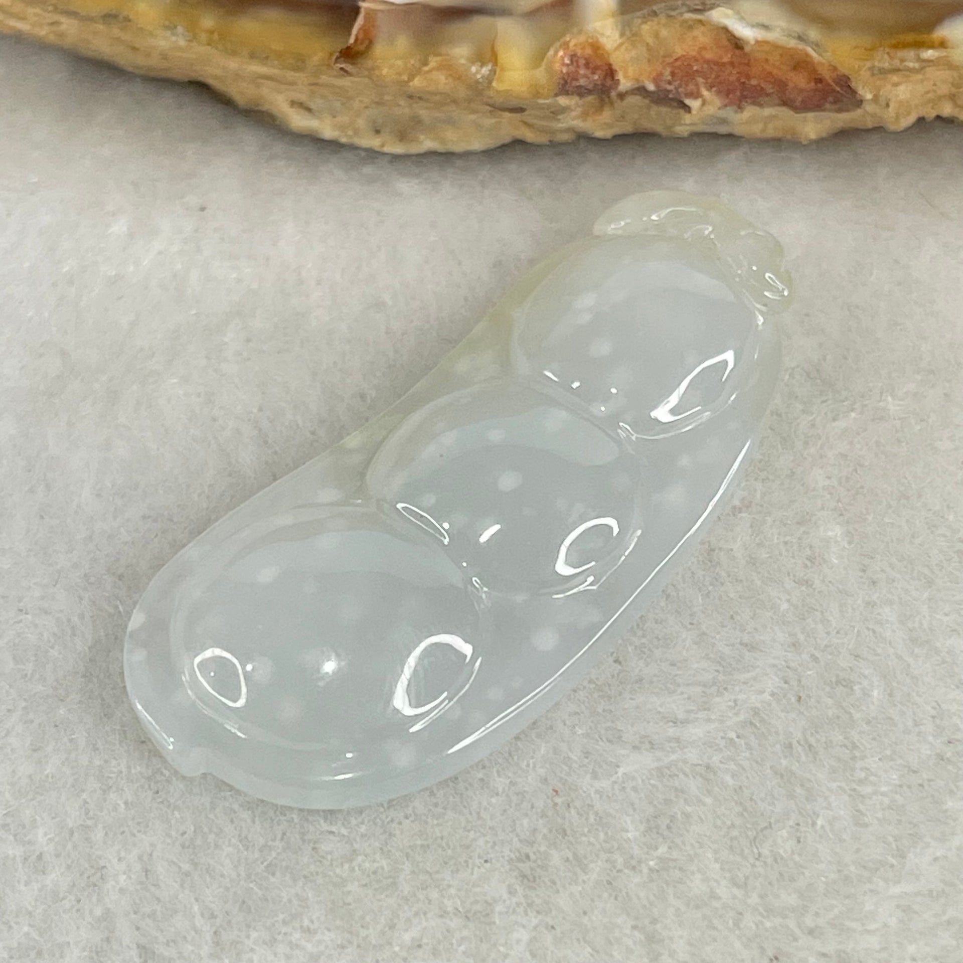 Type A Semi Icy Faint Green with Muna Jadeite Peapod Pendant 5.34g 35.5 by 15.5 by 5.9mm - Huangs Jadeite and Jewelry Pte Ltd