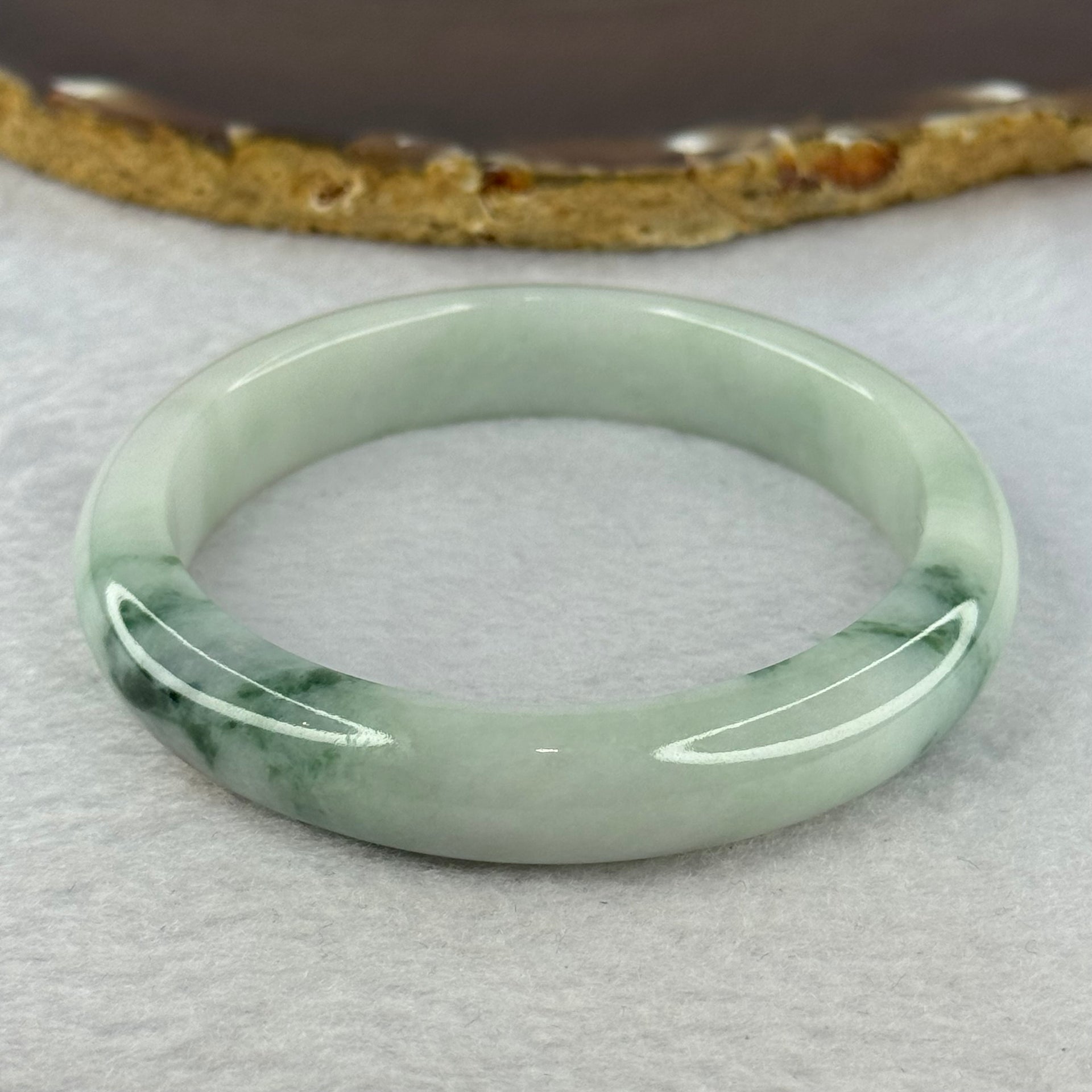 Type A Light Green with Green Piao Hua and Brown Spot Jadeite Bangle Internal Diameter 58.7mm 55.08g 12.4 by 8.5mm (Close to Perfect) - Huangs Jadeite and Jewelry Pte Ltd