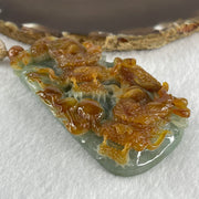 Grand Master Type A Green with Brownish Jadeite Dragon Double Side Pendant 125.78g 77.7 by 46.4 by 18.2mm - Huangs Jadeite and Jewelry Pte Ltd
